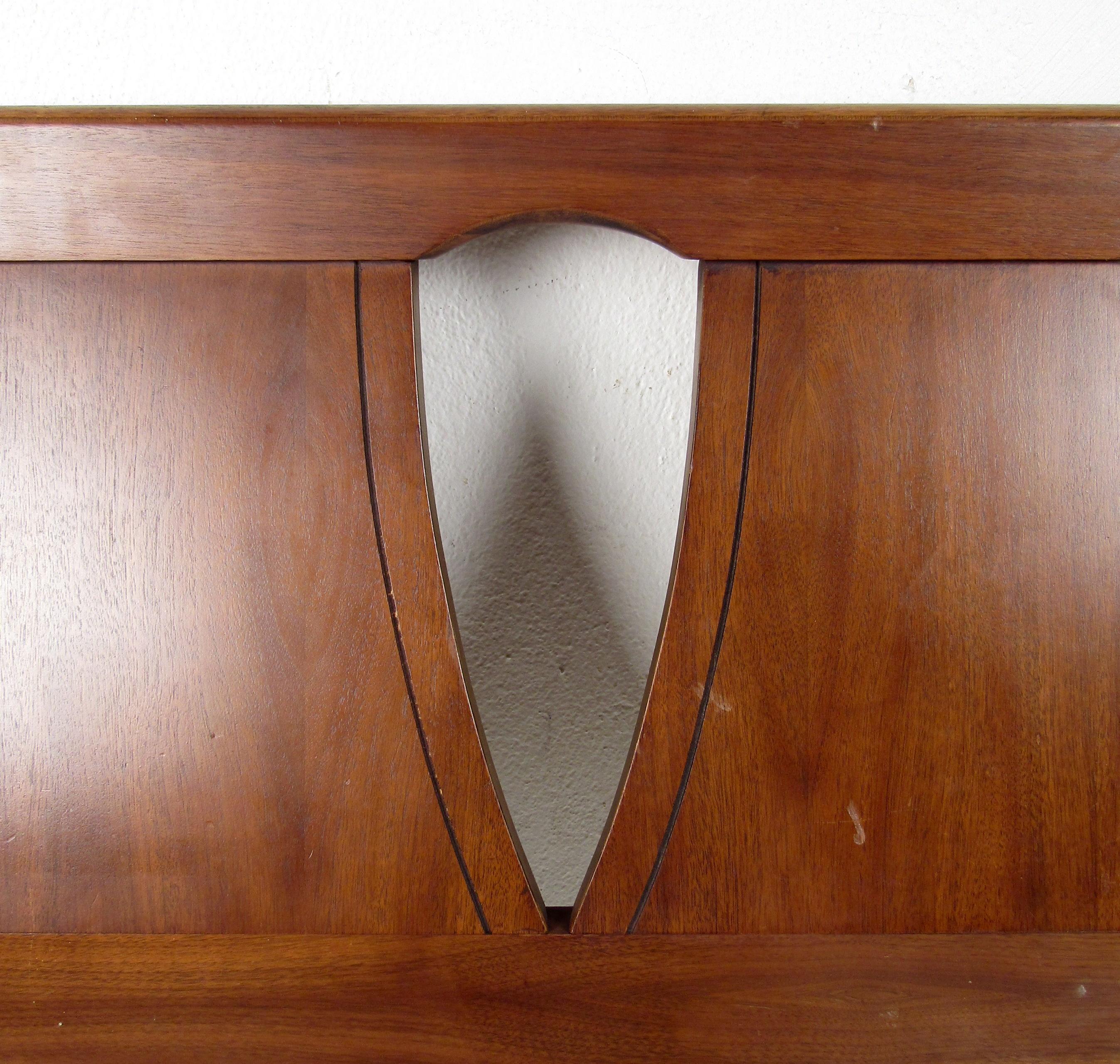 Vintage modern headboard featuring a unique design in rich walnut and elm grain.

Please confirm the item location (NY or NJ).
   