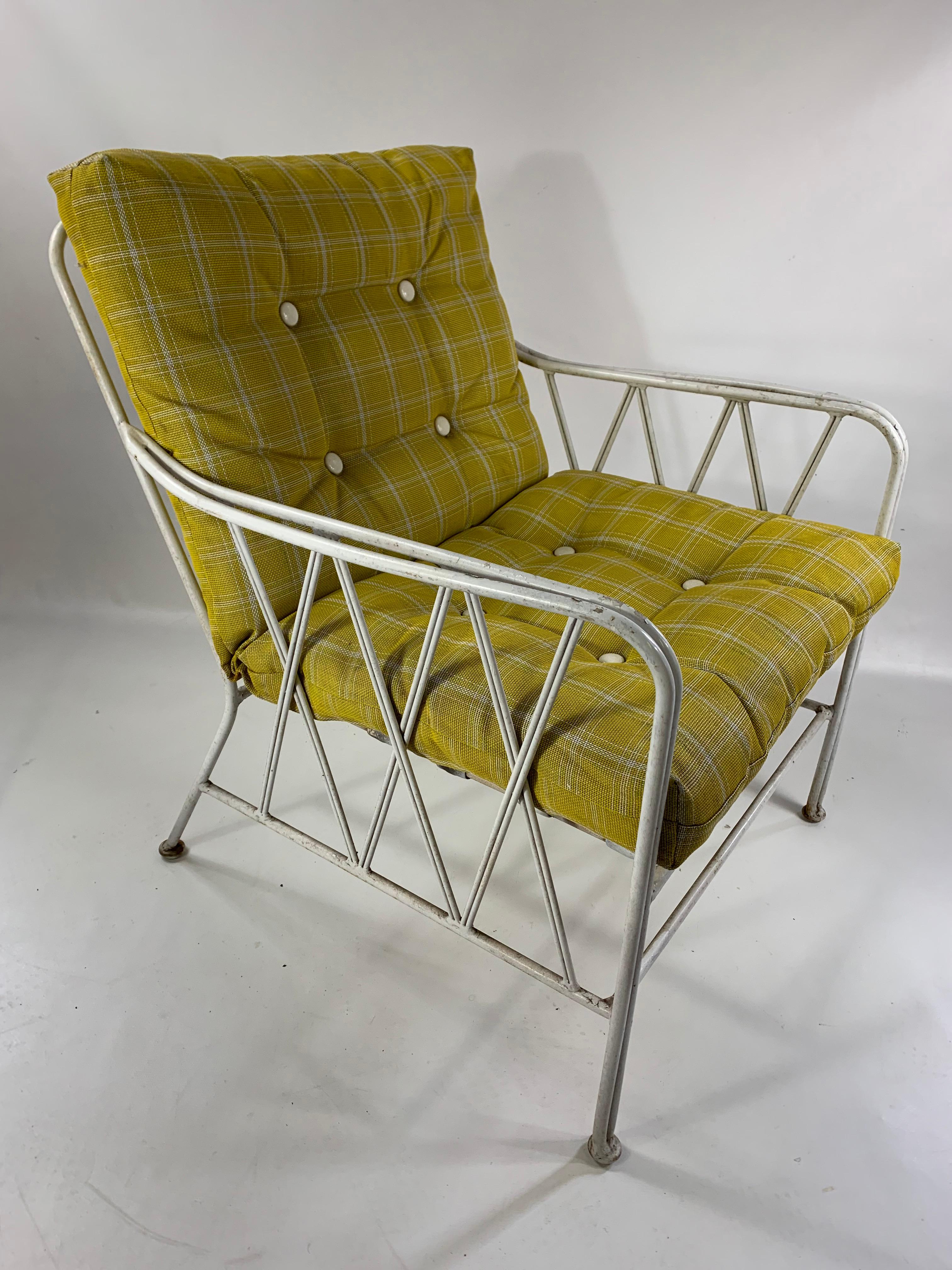 Mid-Century Modern heavy cast iron wire outdoor lounge chair.