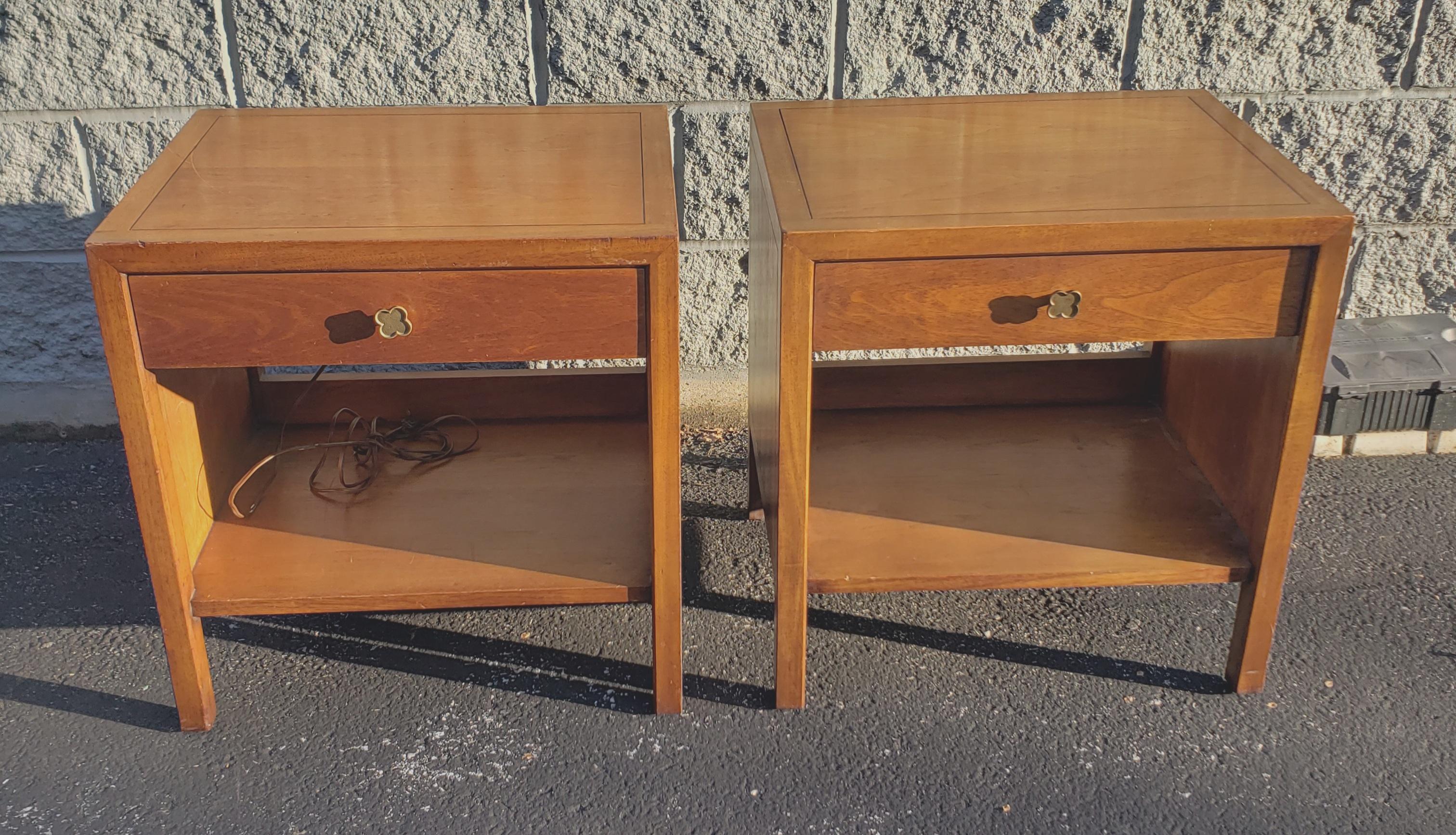 A pair Mid-Century Modern Henredon patinated Walnut Bedside Tables or Nightstands. Prewired for Table lamps Exlectrical extension cord. Measure 22