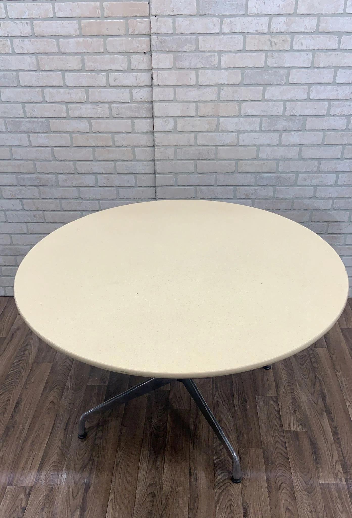 Mid Century Modern Herman Miller 48” Dining Table

This dining table is a timeless piece that effortlessly combines elegance and functionality. Crafted with a cream top and chrome pedestal stand, this round dining table exudes a classic mid century
