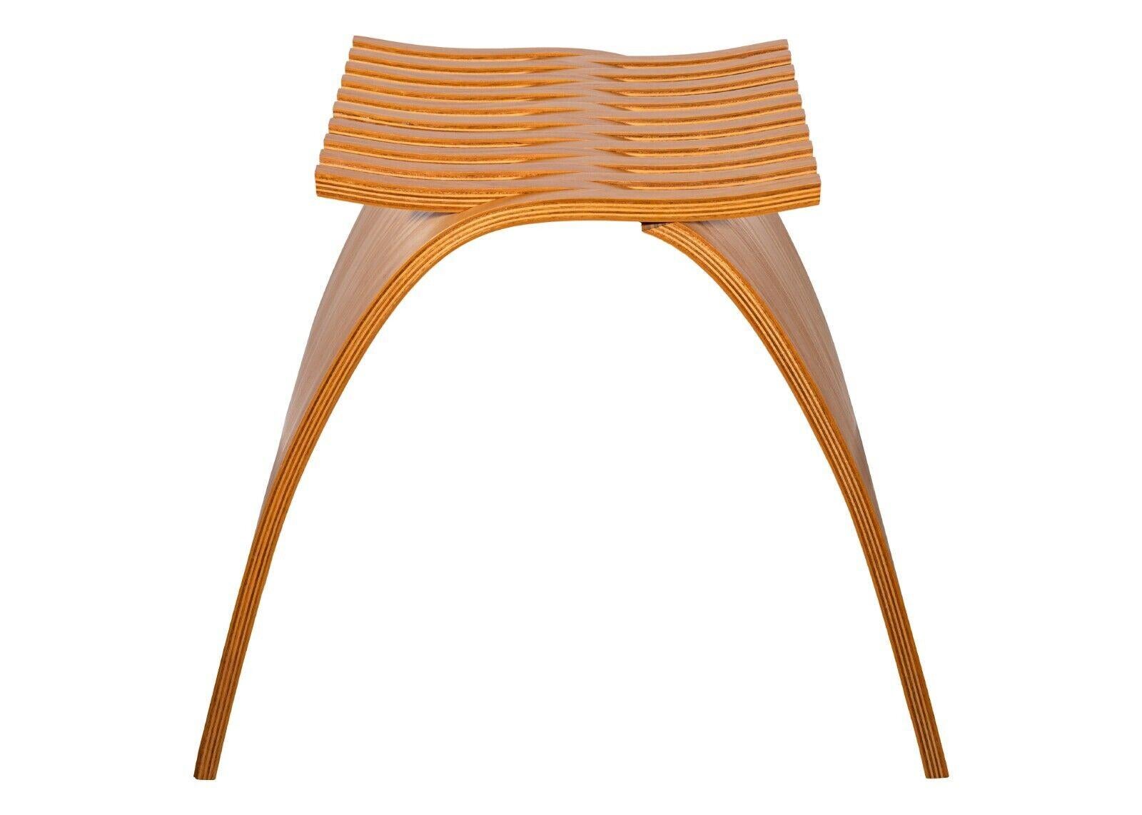 A Herman Miller Capelli stool by Carol Catalano. A wonderful contemporary piece of furniture. This unique little stool brings with it big personality. Its unique design is immediately apparent. This piece stands upon itself using two interlocking