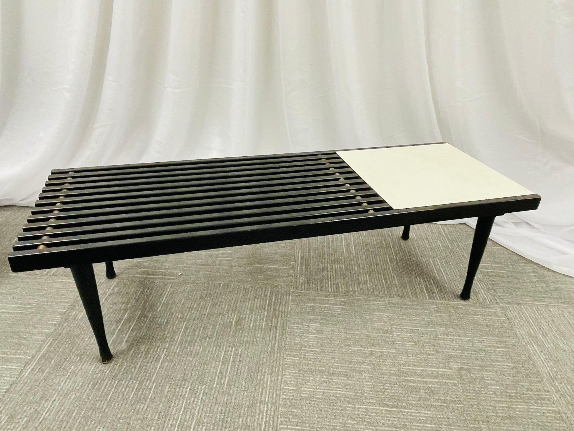 Mid-Century Modern Herman Miller George Nelson slat style brass and ebony coffee table or slat bench. Clean and sweet side or coffee cocktail table with a slat top and Formica side serving side.
Part of our enormous collection of custom black and