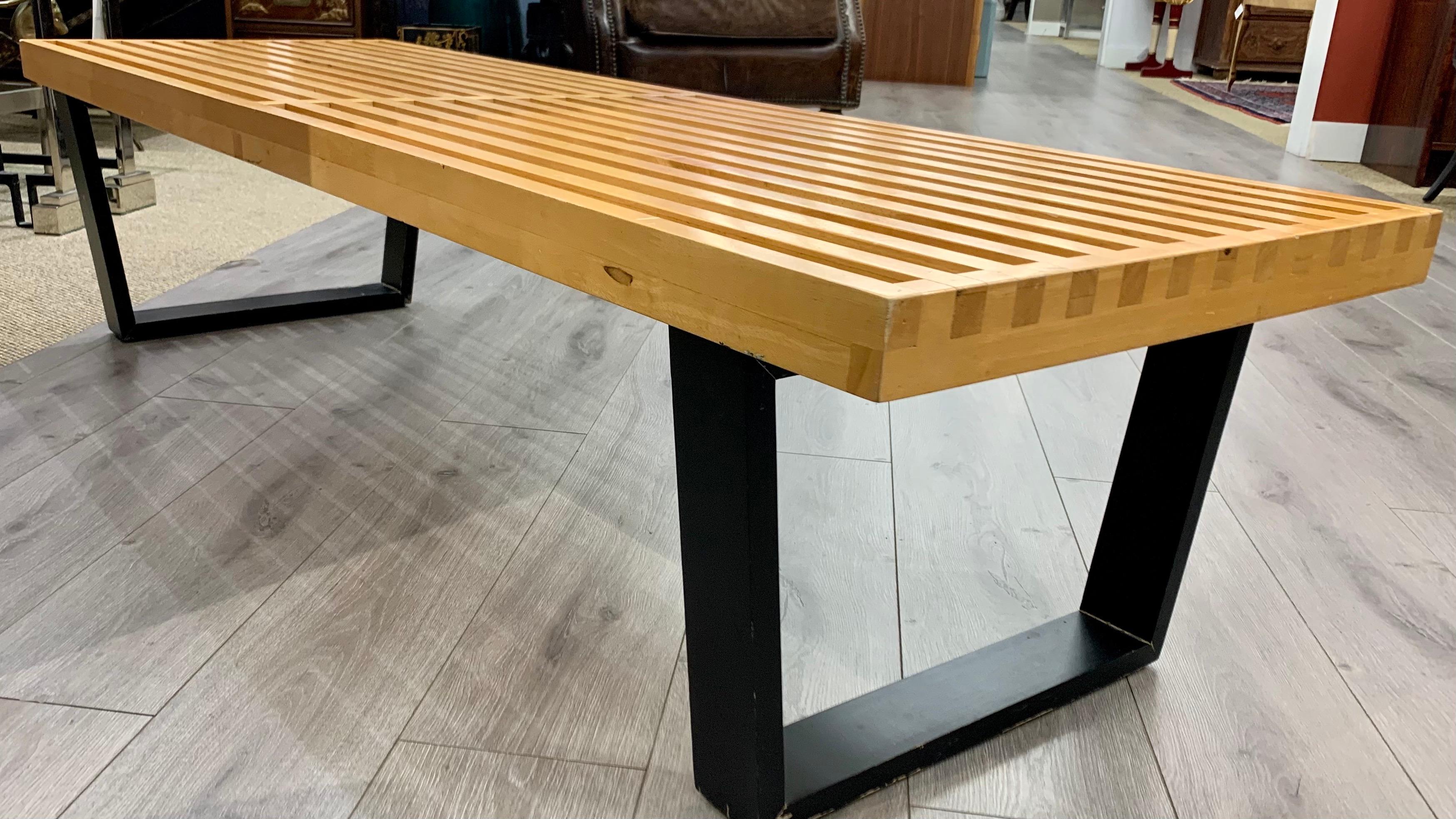 Iconic, signed Herman Miller midcentury wooden slat bench/cocktail table. Multi-purpose and
ingenious. Now more than ever, home is where the heart is.