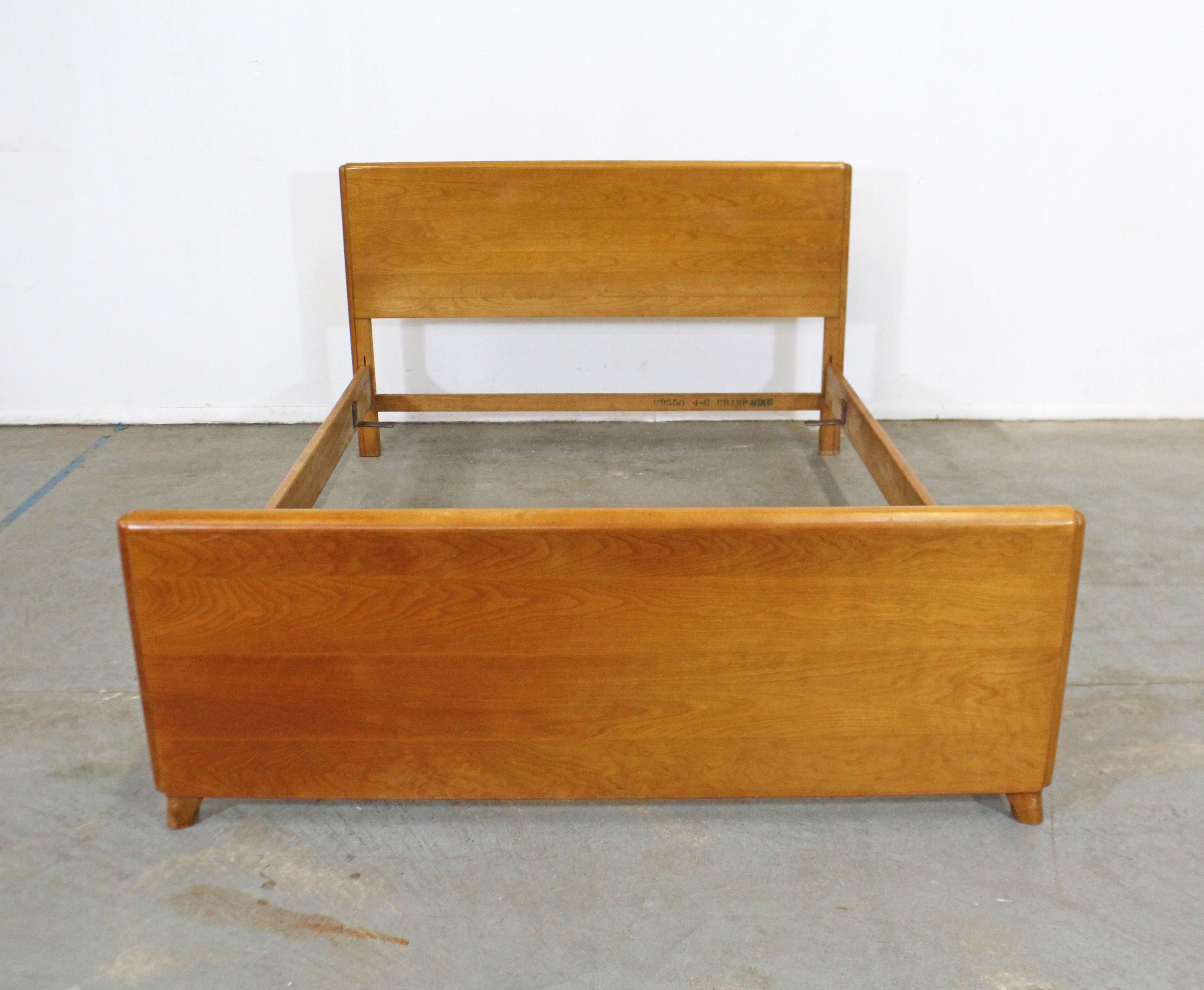 What a find. Offered is a vintage midcentury bed frame designed by Count Alexis de Sakhnoffsky for Heywood Wakefield's 'Crescendo' line. This is a full size bed frame, including headboard, foot board, and rails. The piece is in decent condition