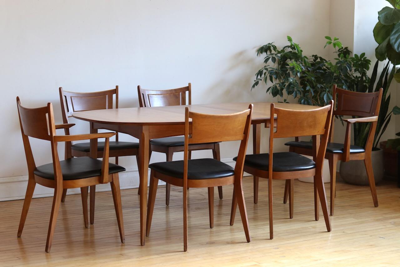 Mid-Century Modern dining table and chairs.
Rare dining set designed for Heywood Wakefield's 