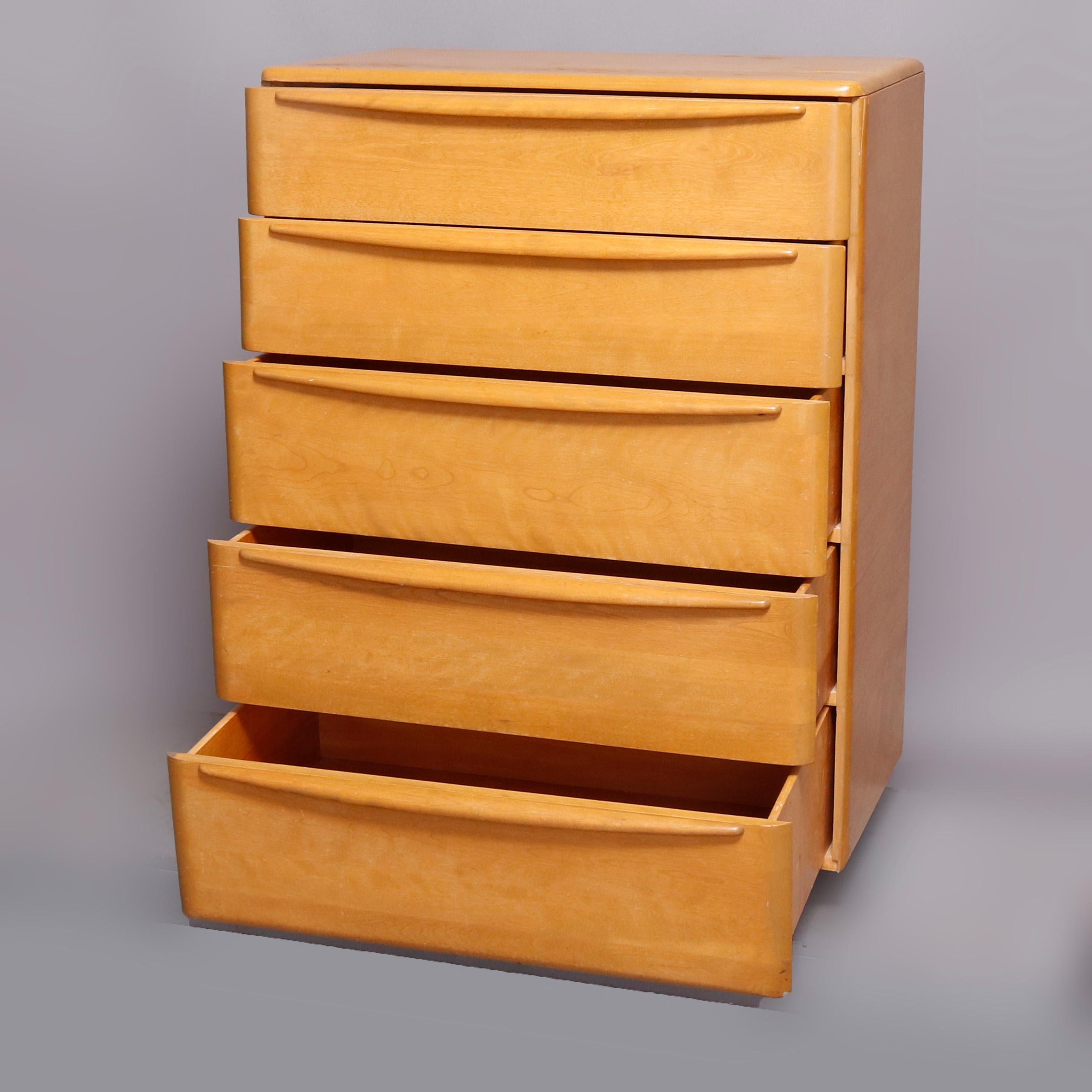 A Mid-Century Modern highboy dresser by Heywood Wakefield offers the birch construction in the Encore pattern in Wheat finish and having five long drawers, mid-20th century

***DELIVERY NOTICE – Due to COVID-19 we are employing NO-CONTACT PRACTICES
