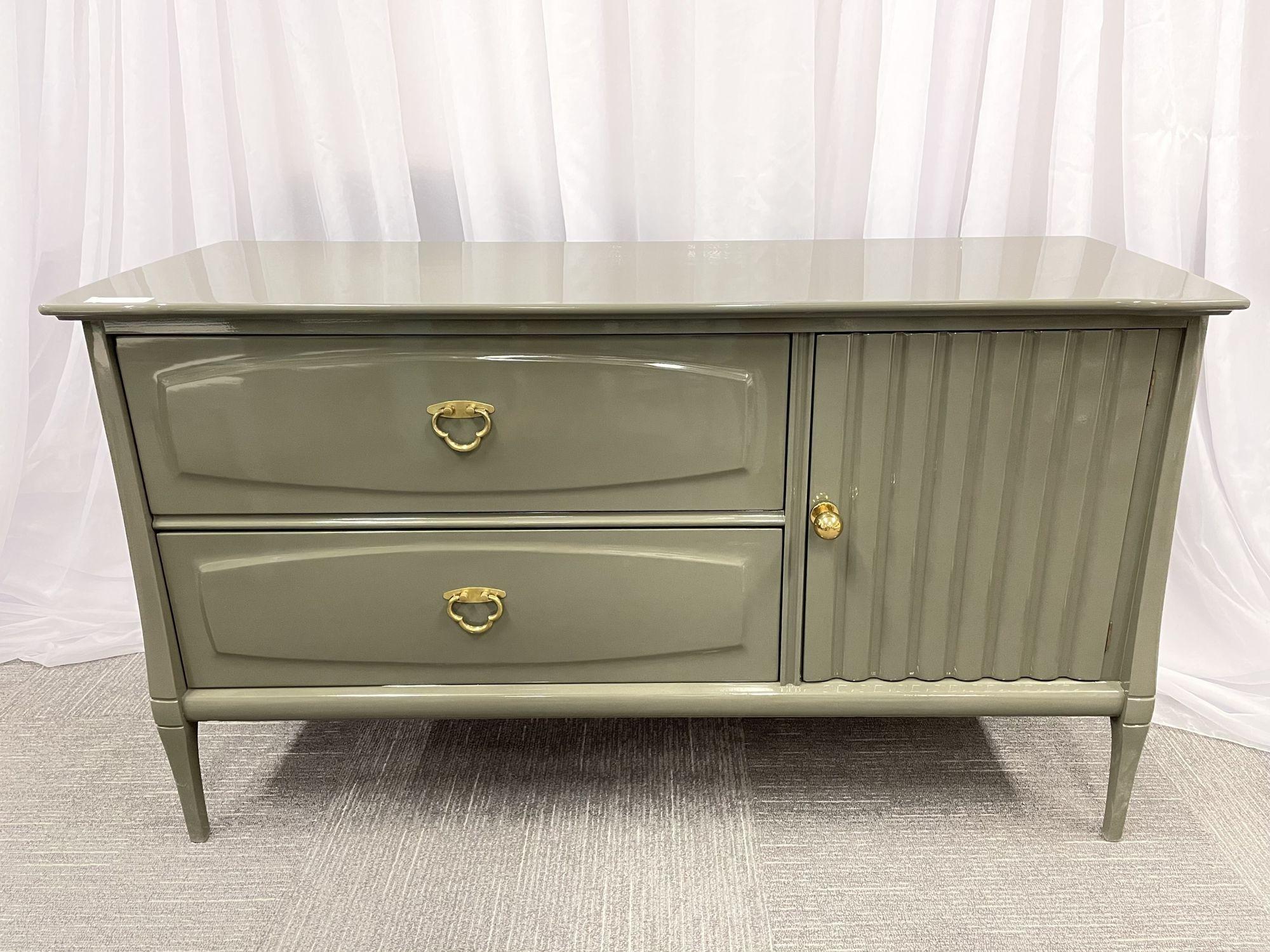 A Mid Century Modern Heywood Wakefield Server, Commode, Dresser recently lacquered in a wonderful olive green with a bronze mounts
Other American designers of the period include Adrian Pearsall, Milo Baughman, Vladimir Kagan, Paul McCobb, Paul
