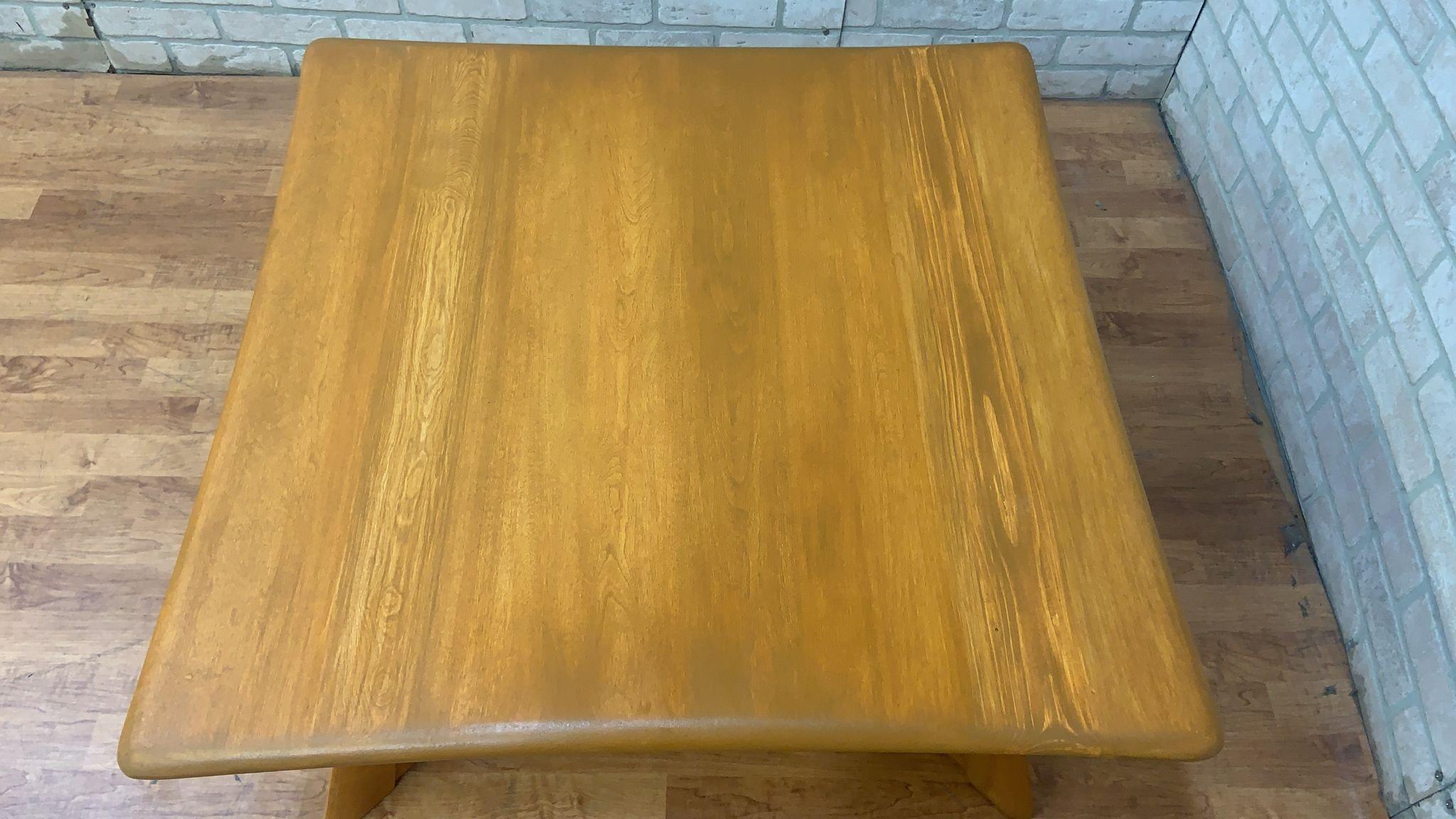 Mid Century Modern Heywood Wakefield X Base Square Coffee Table

The Heywood-Wakefield X Base Square Coffee Table is a classic piece of furniture that embodies the Mid-Century Modern design aesthetic. It features a square tabletop crafted from