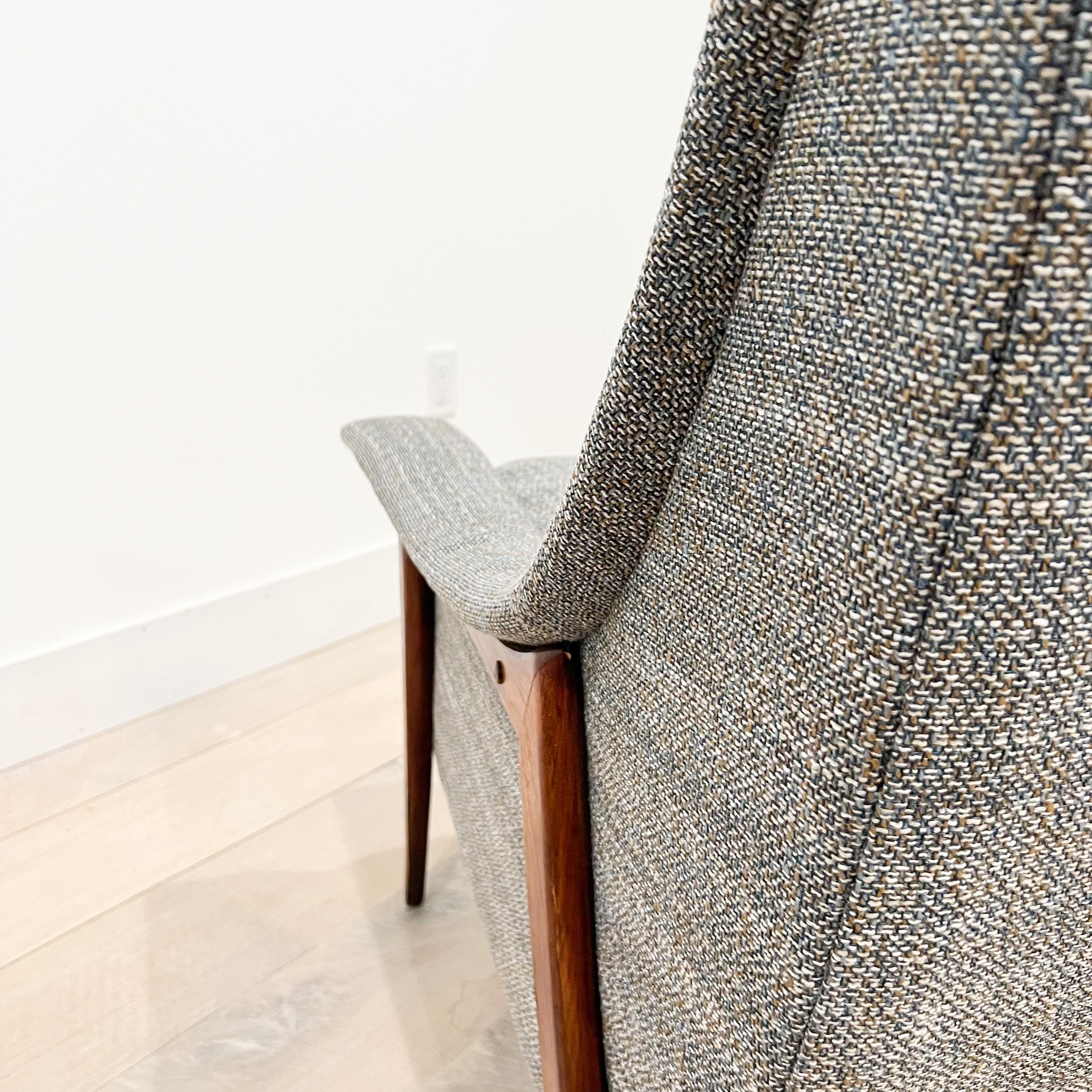 High back lounge chair by Kroehler. New tufted blue/grey tweed upholstery. Some scuffing/scratching to the chair legs from age appropriate wear.