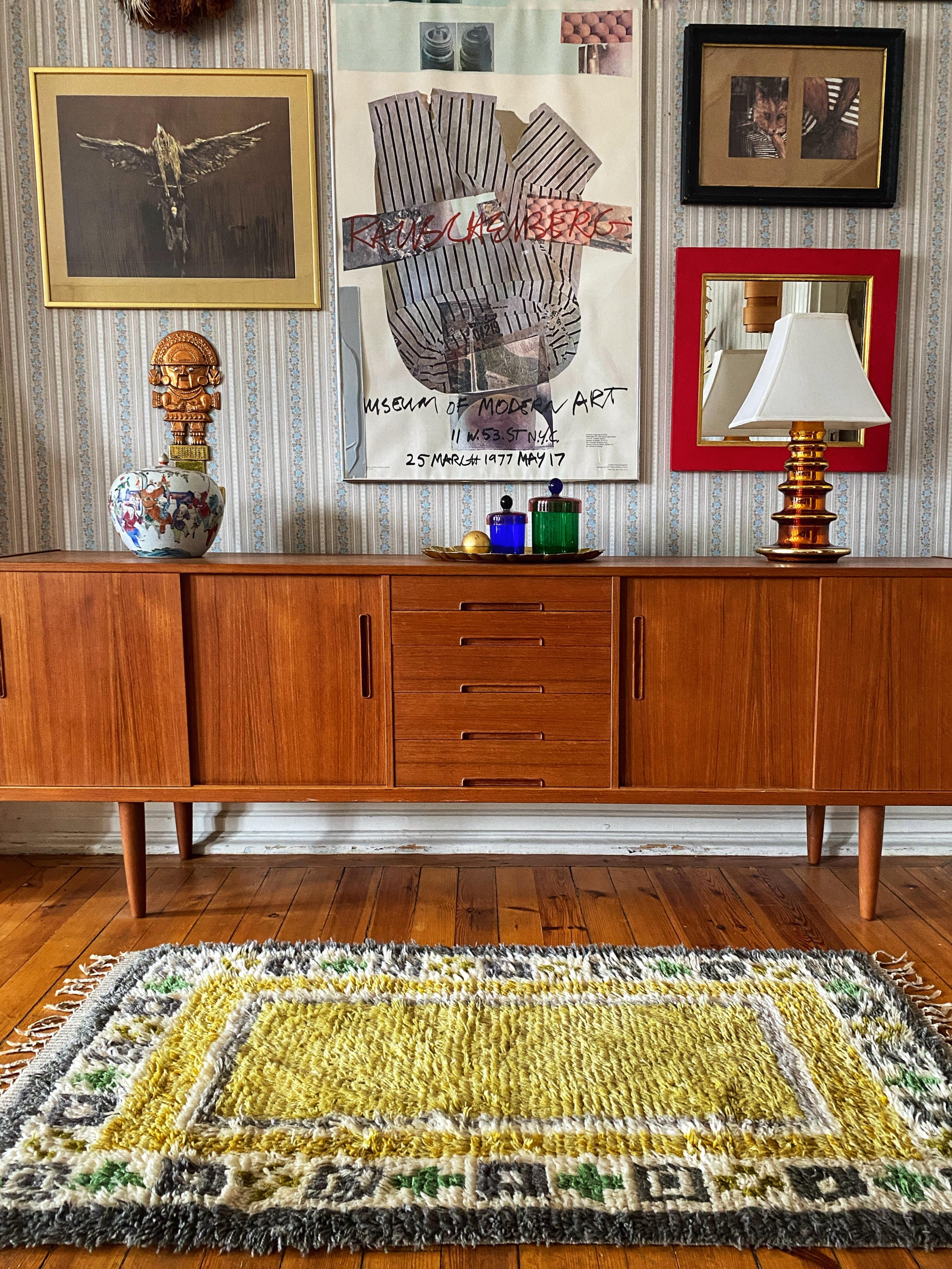 This exquisite mid-century modern rya rug, crafted by a Swedish textile artist in the 1960s, showcases the finest Scandinavian craftsmanship. Handmade from premium 