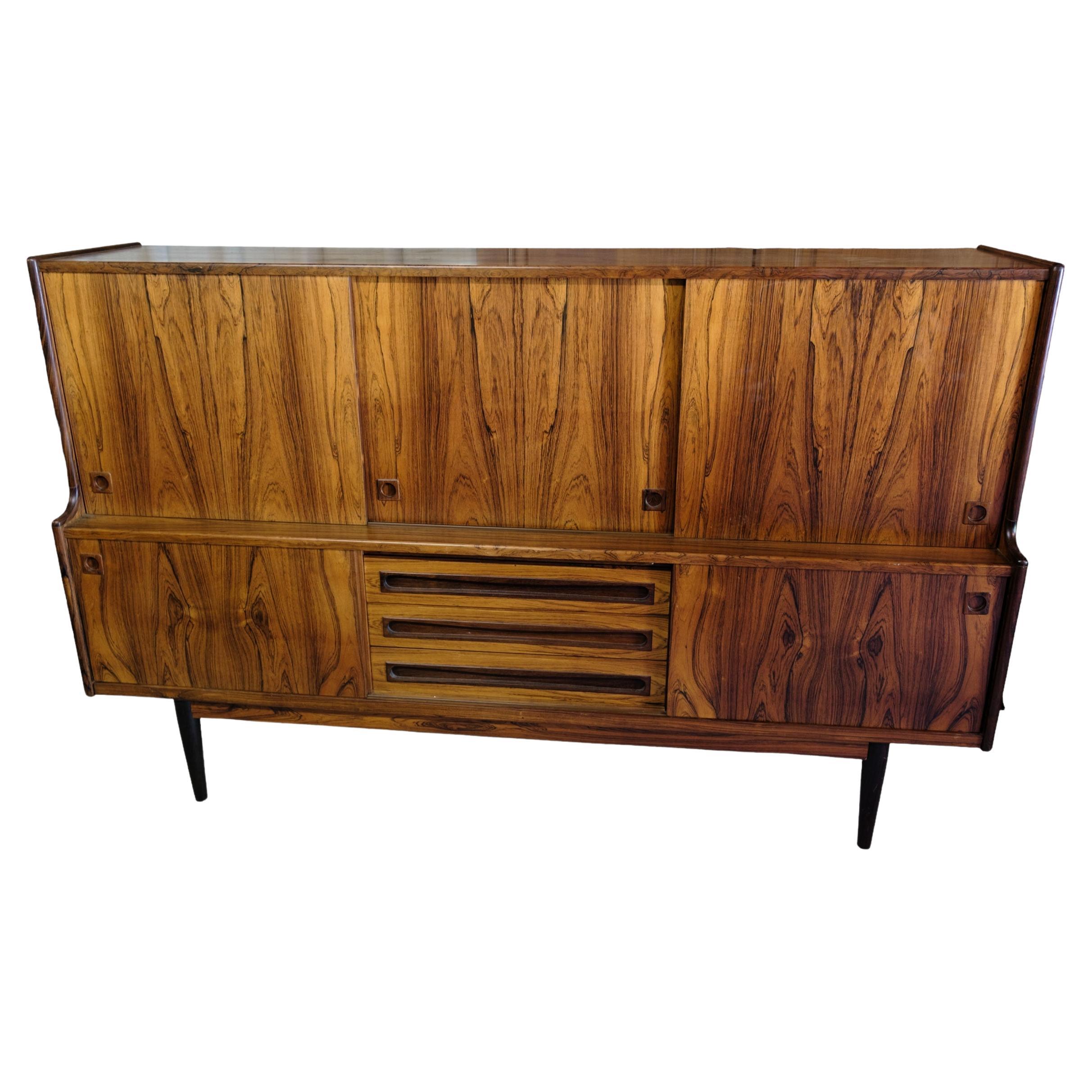 Mid-Century modern high sideboard by Johannes Andersen from around the 1960s For Sale