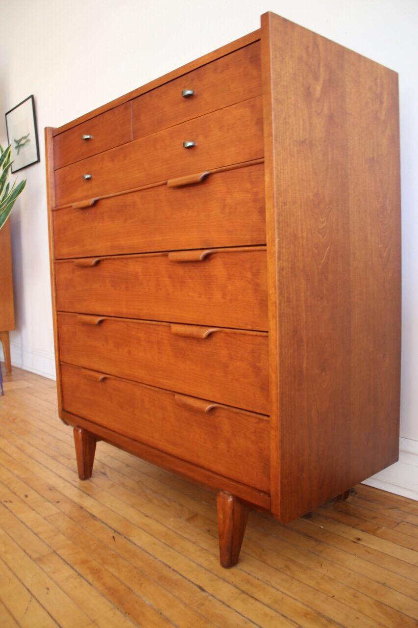 Mid-Century Modern tall dresser by Century Furniture.
Seven dovetailed drawers in total.
Beautiful cherrywood grain.
Danish style curved handles.
Uniquely designed legs.
One drawer holds dividers.
Built like a tank; heavy and