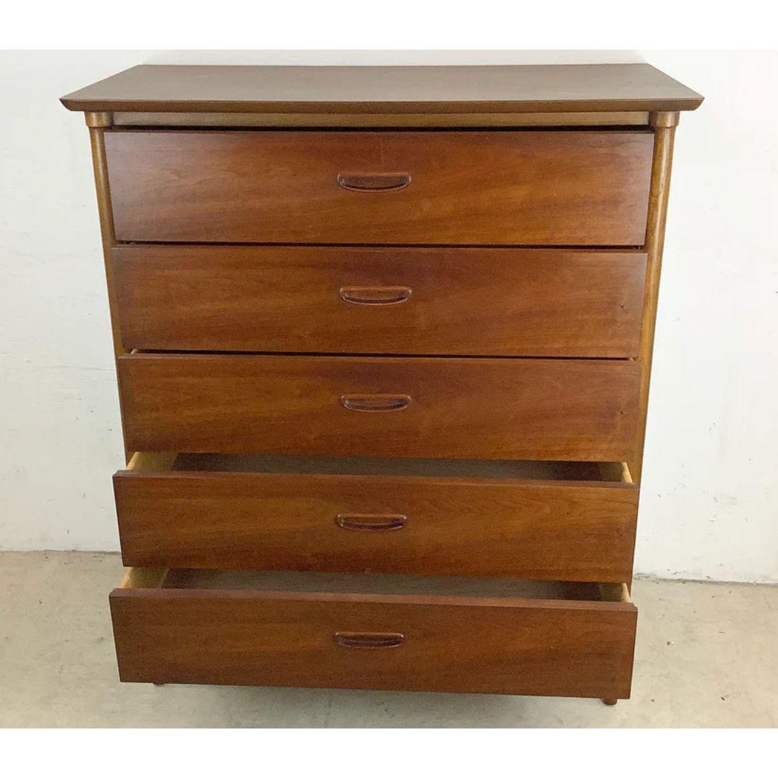 Experience the epitome of midcentury charm with this Mid-Century Modern Highboy Dresser by Lane, available now.

Crafted with exceptional attention to detail, this dresser showcases timeless elegance and impeccable craftsmanship. The clean lines,