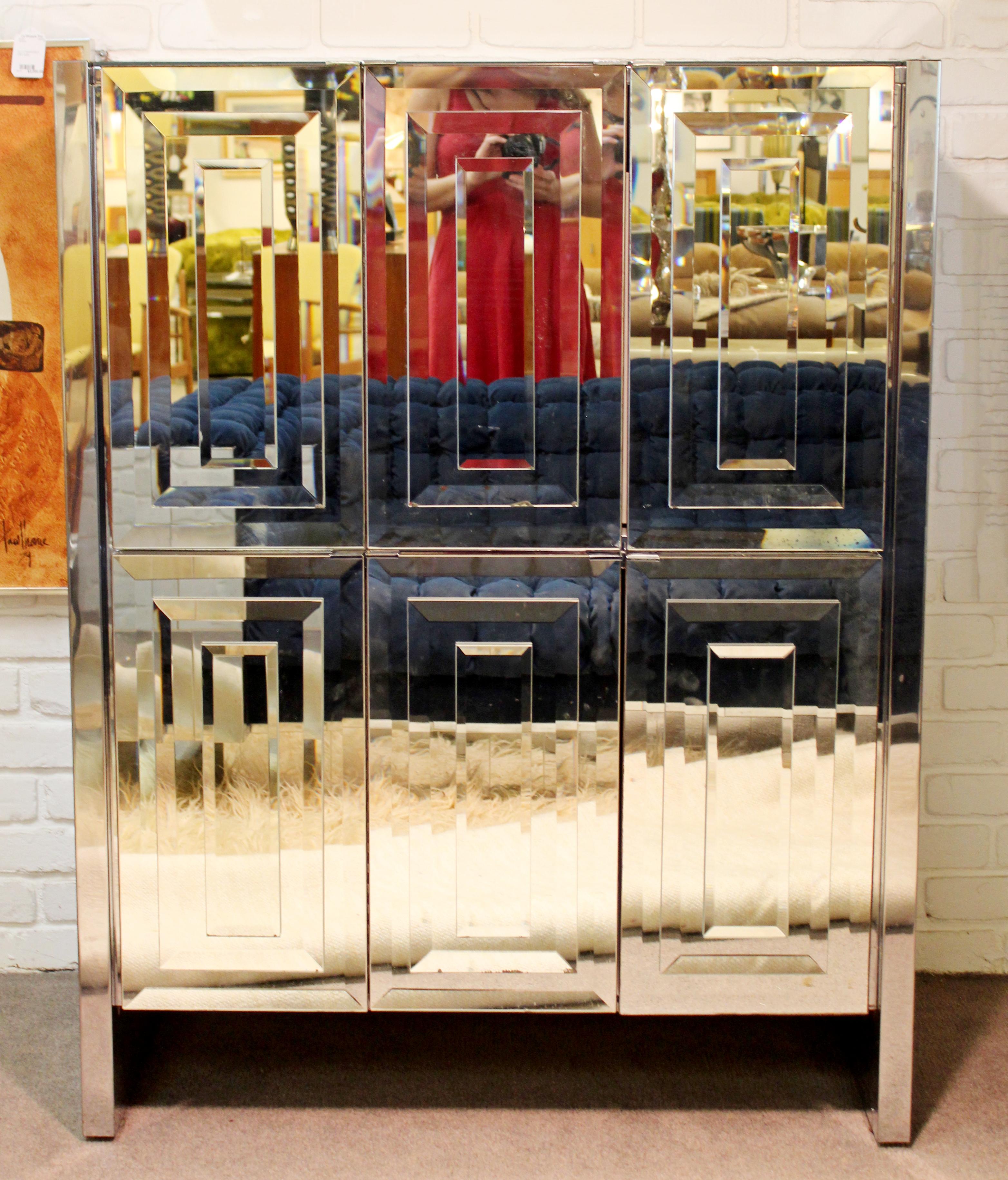 For your consideration is an absolutely fabulous, mirrored dry bar cabinet, drop down front, by Ello, circa the 1970s-1980s. In very good vintage condition. The dimensions are 40