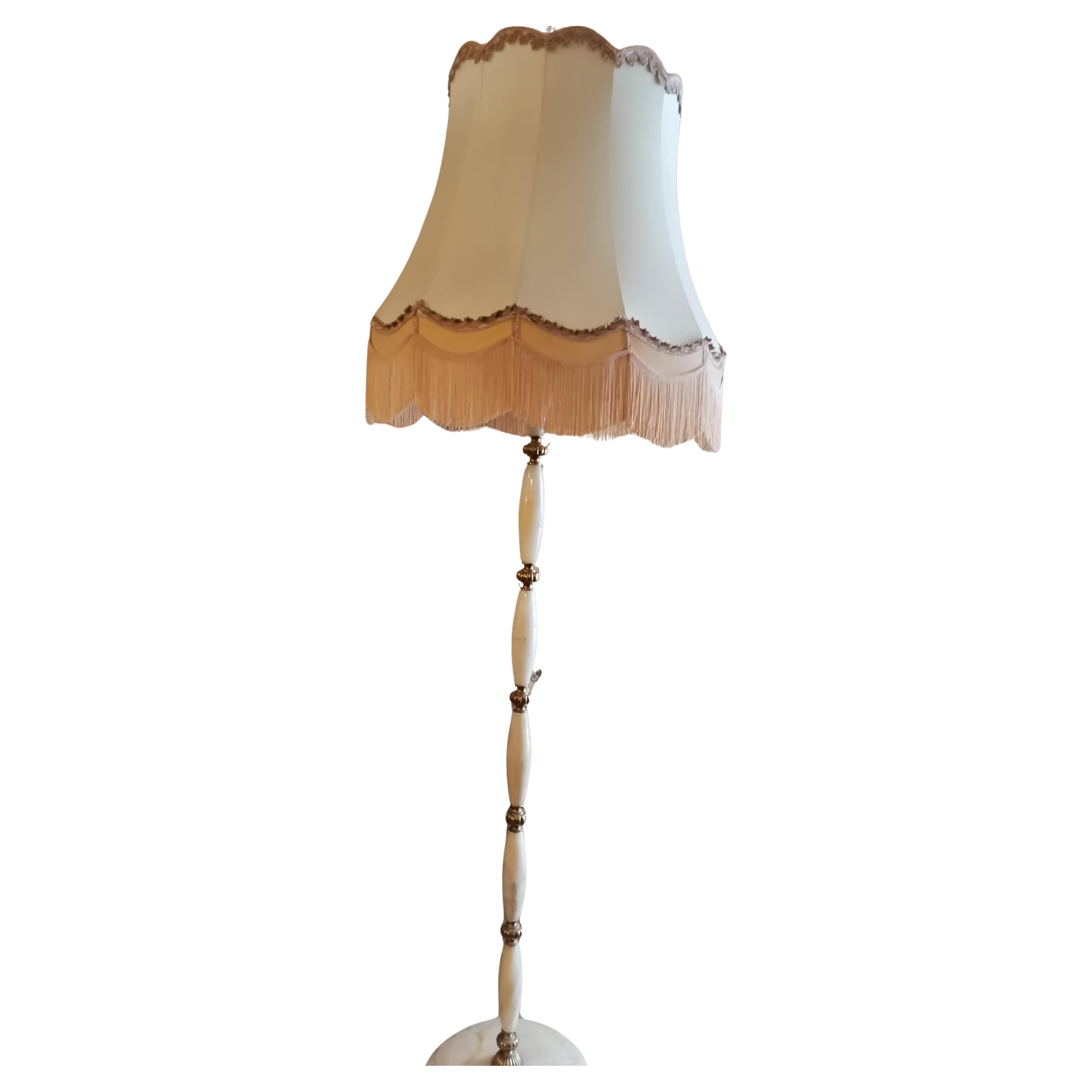 Mid-Century Modern Hollywood Regency

Lampada da terra Hollywood Regency in marmo onice e ottone, Italia anni '60, buone condizioni
