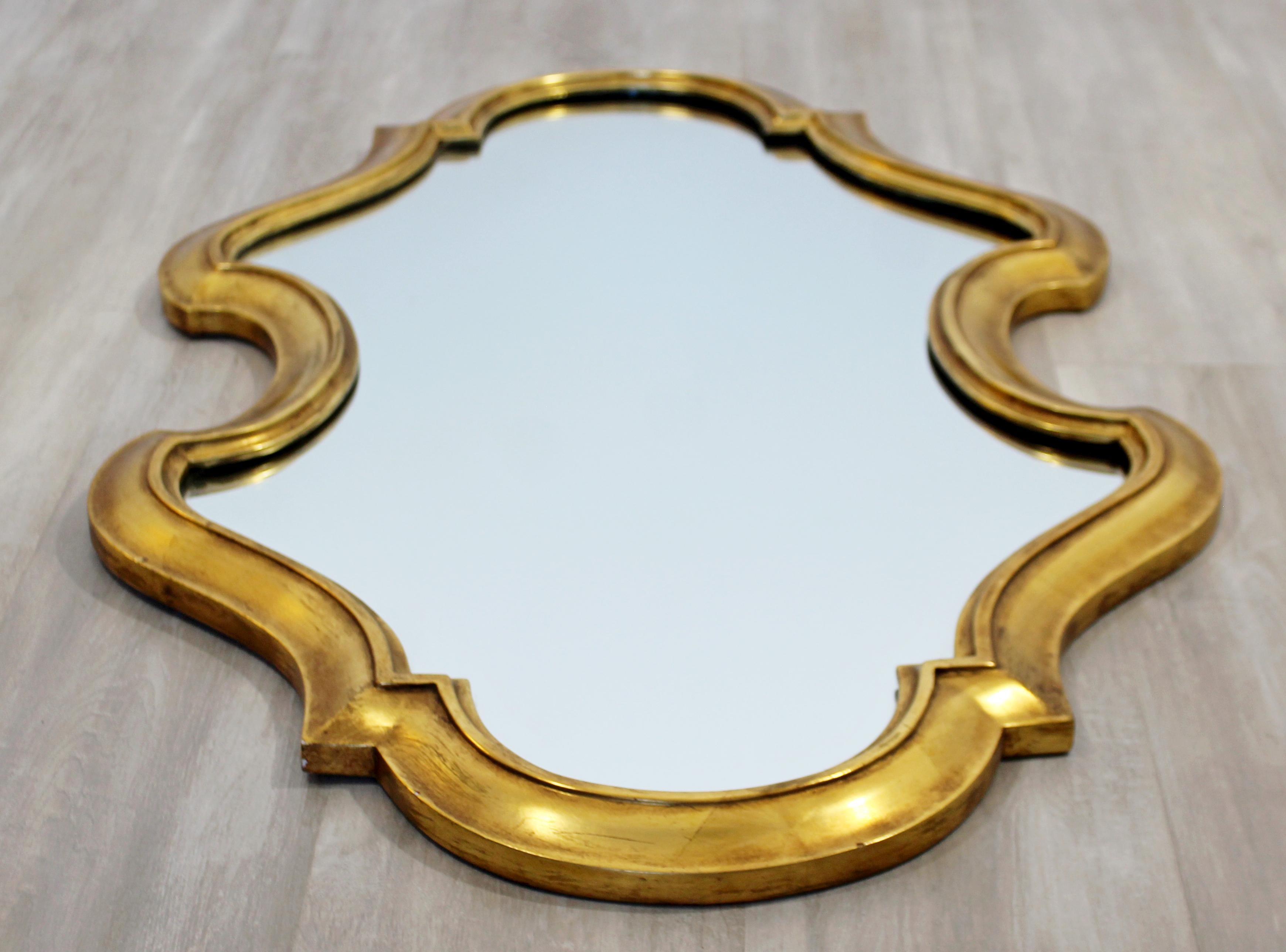 For your consideration is a gorgeous, gold gilded wood, wall mirror by La Barge, circa 1960s. In very good vintage condition. The dimensions are 24
