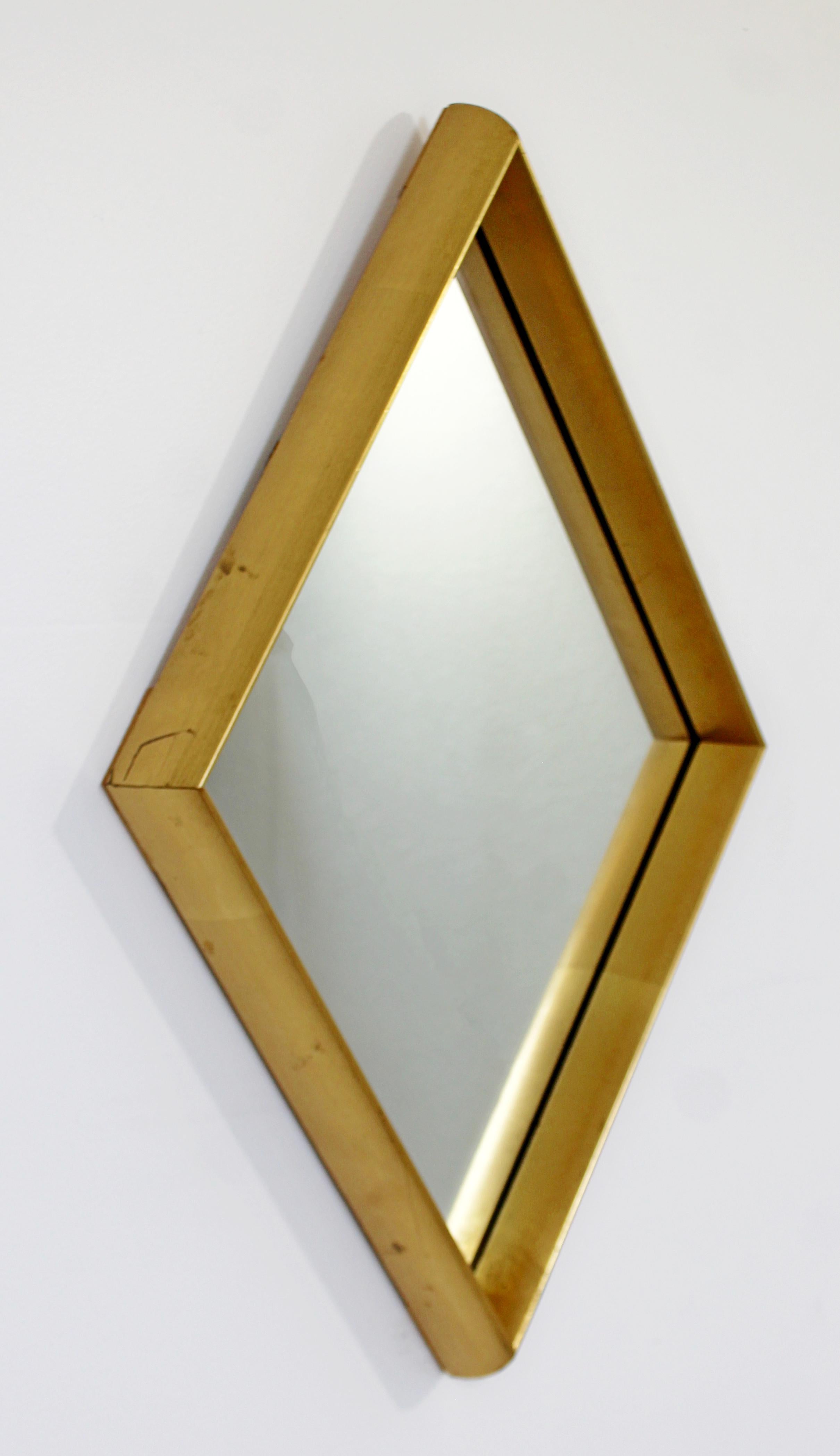 For your consideration is a delightful, diamond shaped, gold gilded wood wall mirror by La Barge, circa 1960s. In very good vintage condition. The dimensions are 17