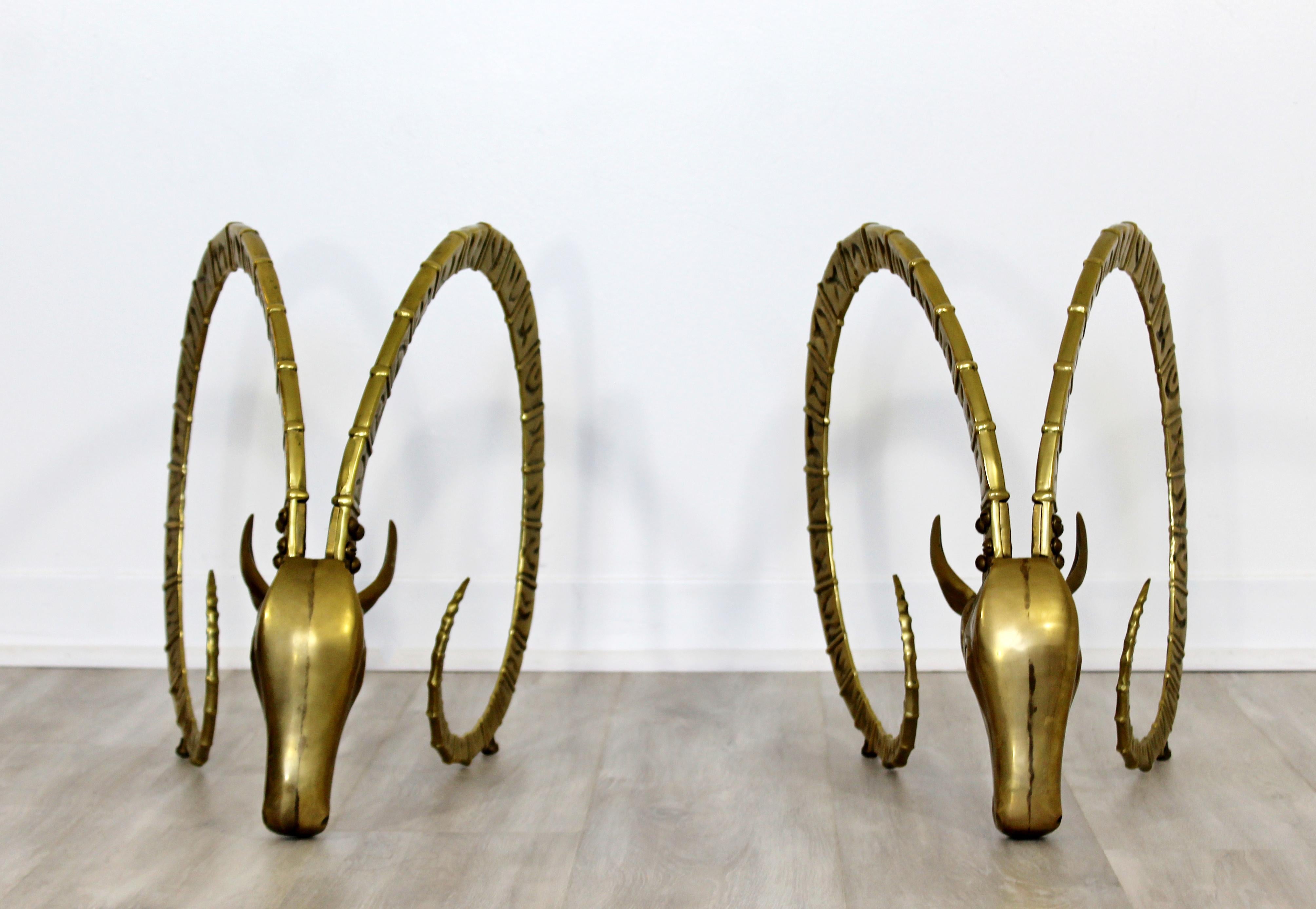 For your consideration is a stunning pair of ibex heads, made of bronze, in the style of Alain Chervet, circa 1970s. Can be used as a coffee table base or as stand alone sculptures. In excellent condition. The dimensions of each are 13