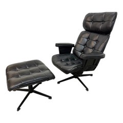 Sedia girevole in pelle nera Homecreast in stile Eames della metà del secolo scorso
