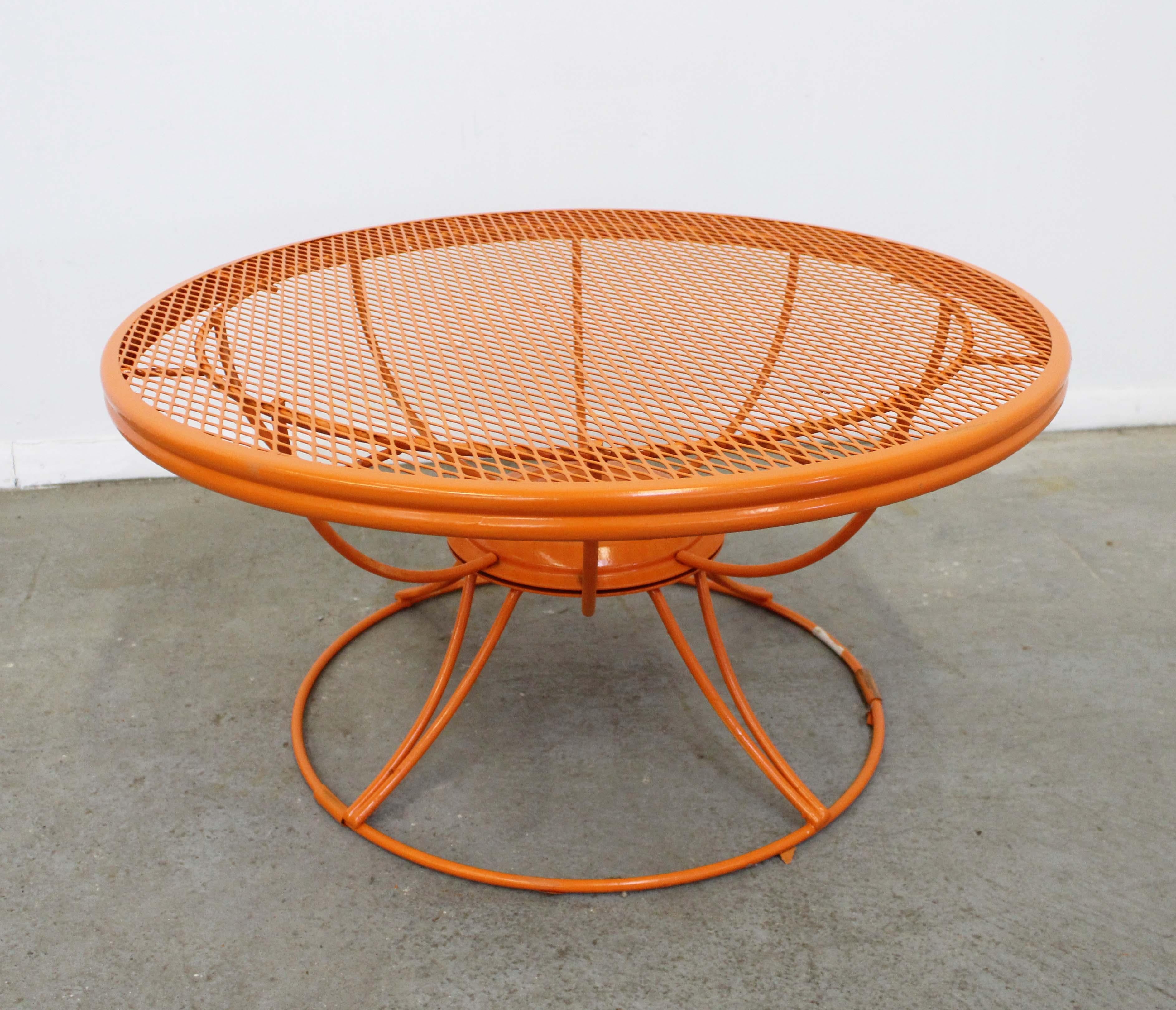 What a find. Offered is a midcentury outdoor/patio round swivel 
