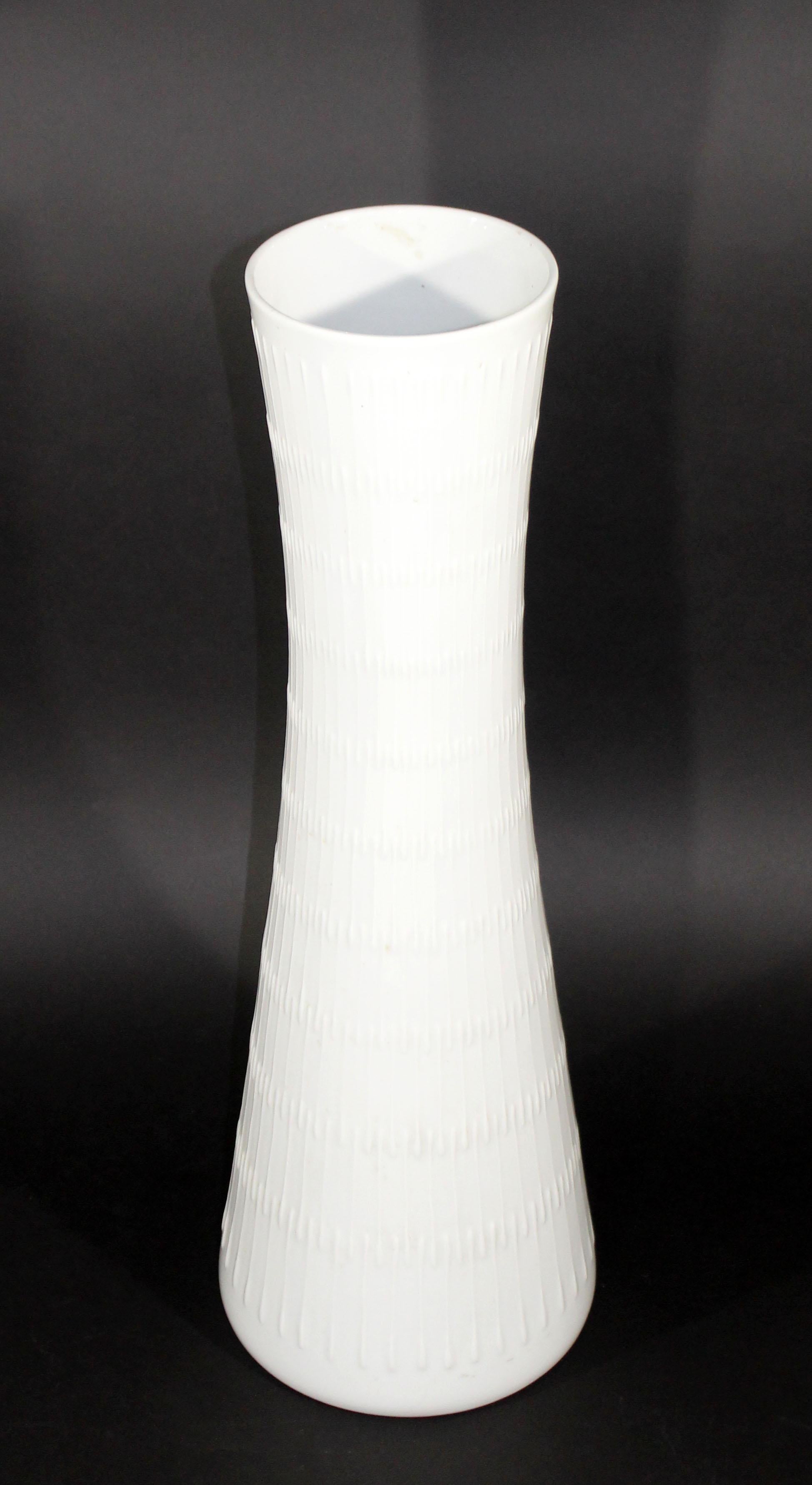 For your consideration is an incredible, white porcelain, tall vase, made in Germany, by Hutschenreuther, circa the 1970s. In excellent condition. The dimensions are 9.5