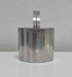 Mid Century Modern Ice Bucket with Lid done in chrome designed by Arne Jacobsen