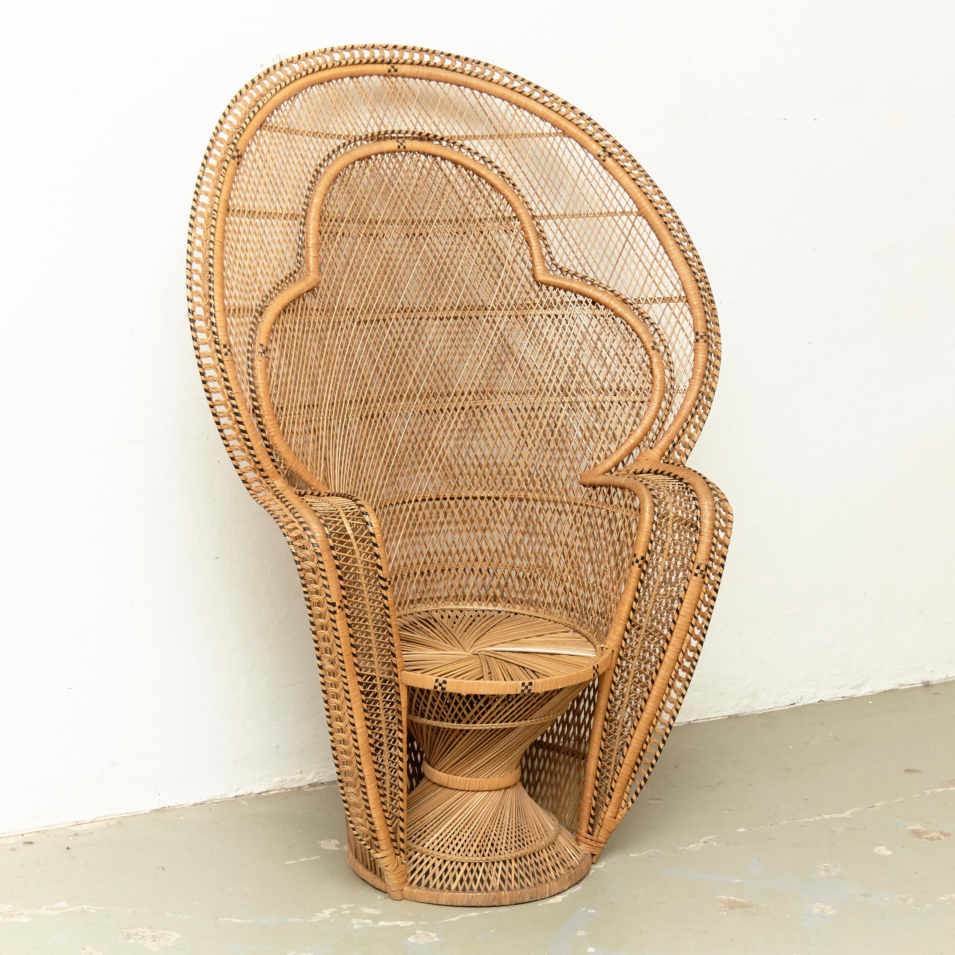 Mid-Century Modern large Emmanuelle armchair rattan, circa 1960
Traditionally manufactured in France.

By unknown designer.

In original condition with minor wear consistent of age and use, preserving a beautiful patina.

 