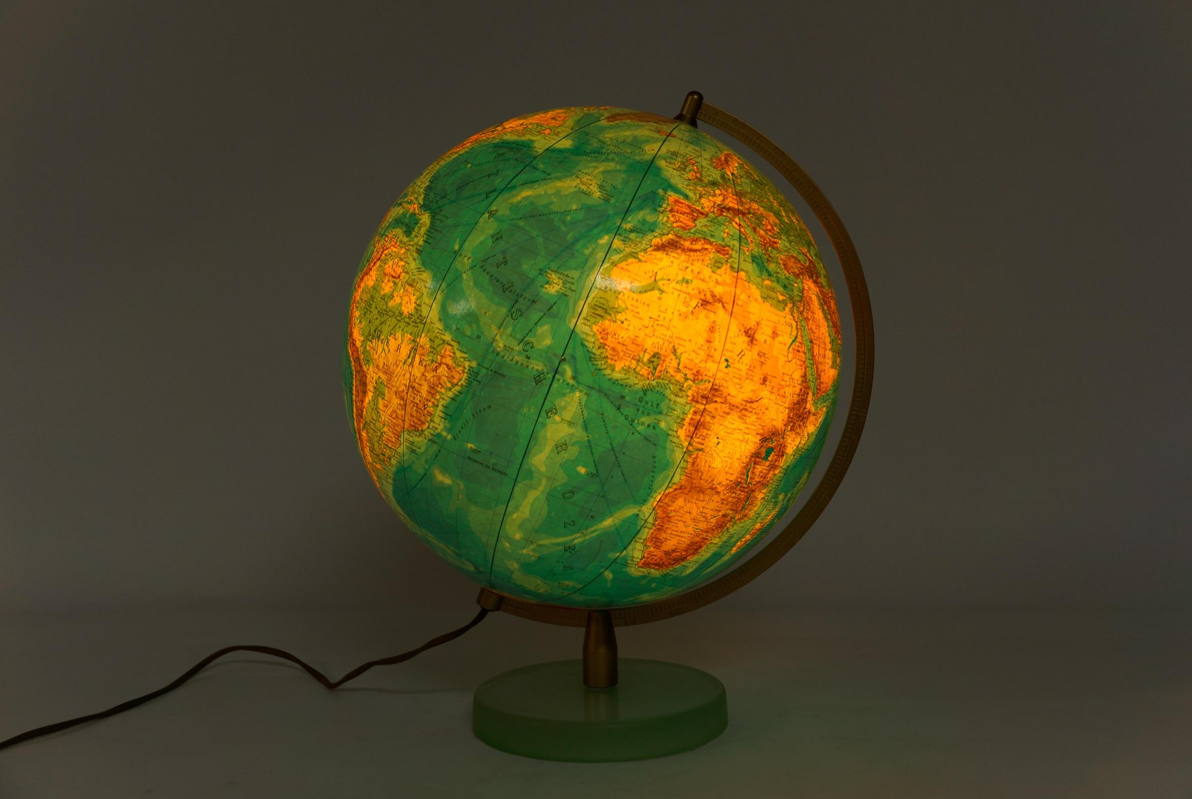 Metal Mid-Century Modern illuminated glass globe on a satin glass base by Columbia Duo For Sale