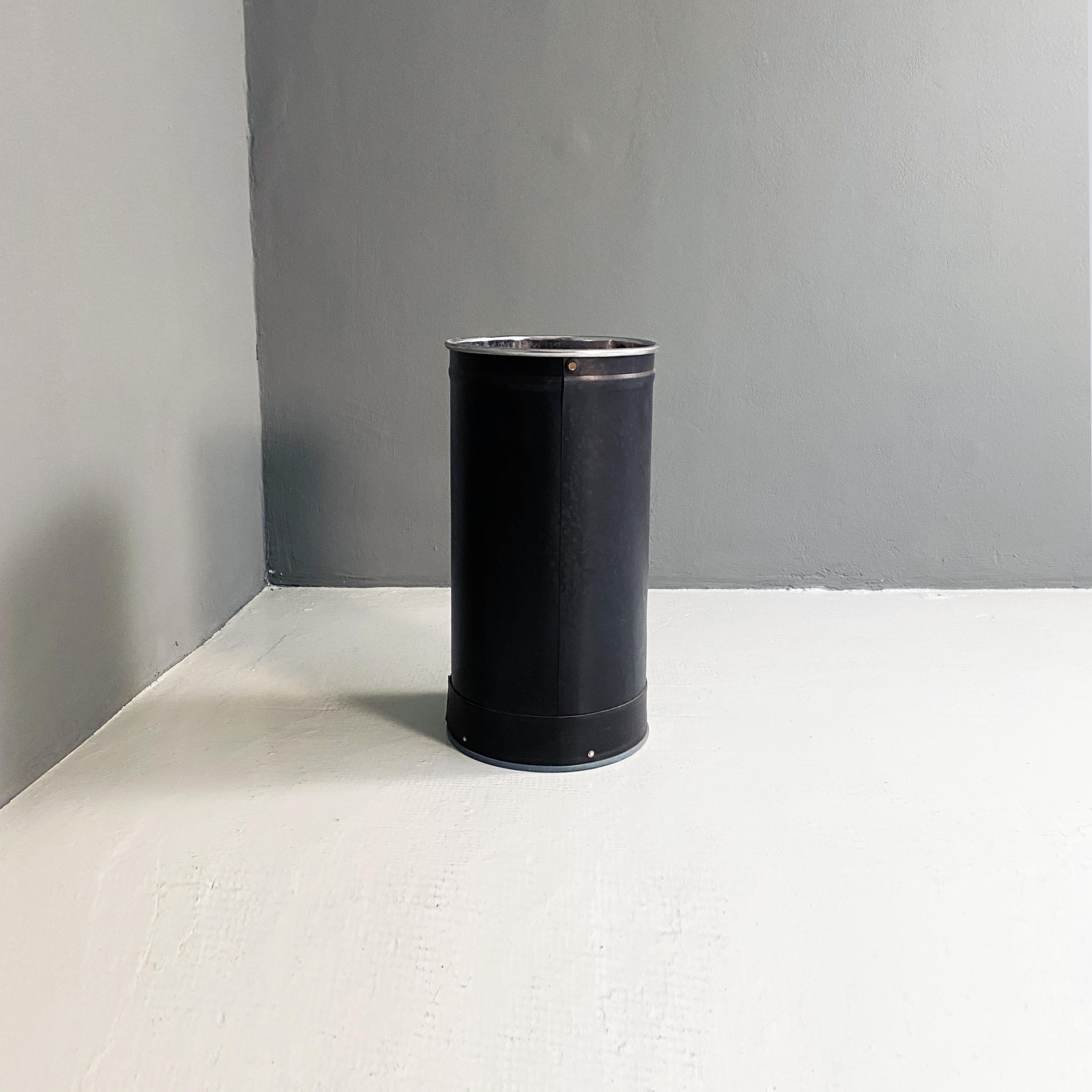Mid-Century Modern Industrial black plastic metal bin by Victor, 1960s
Industrial black plastic and metal bin with structure covered in black plastic that can be used as an object holder, umbrella Stand and container. Marked Victor from the 1960s