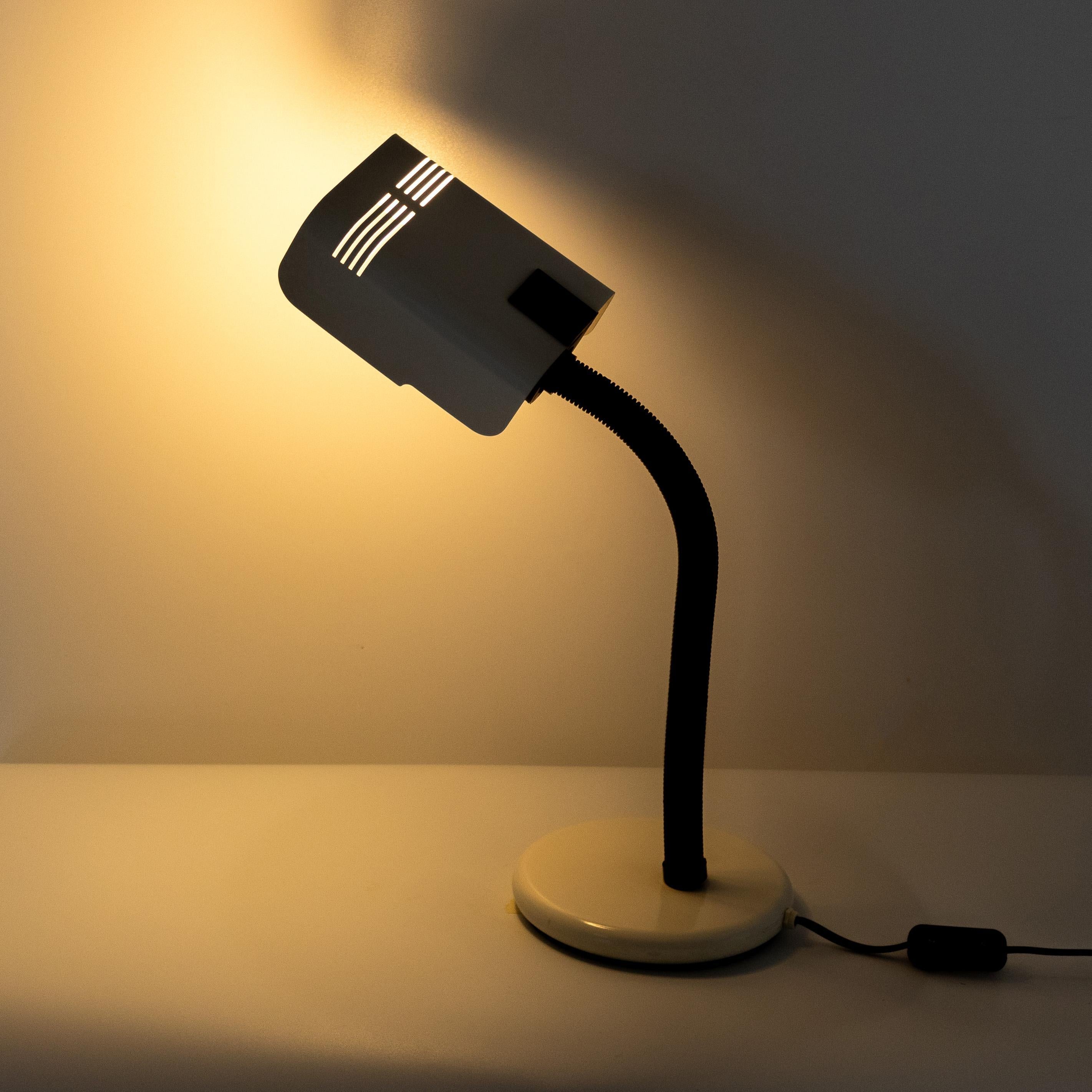 Mid Century Modern Industrial Desk Lamp, Gino Sarfatti for Targetti, Italy 1970

Designed in the vibrant design landscape of 1970s Italy, this lamp carries the hallmarks of both Sarfatti's touch and Targetti's commitment to quality craftsmanship.