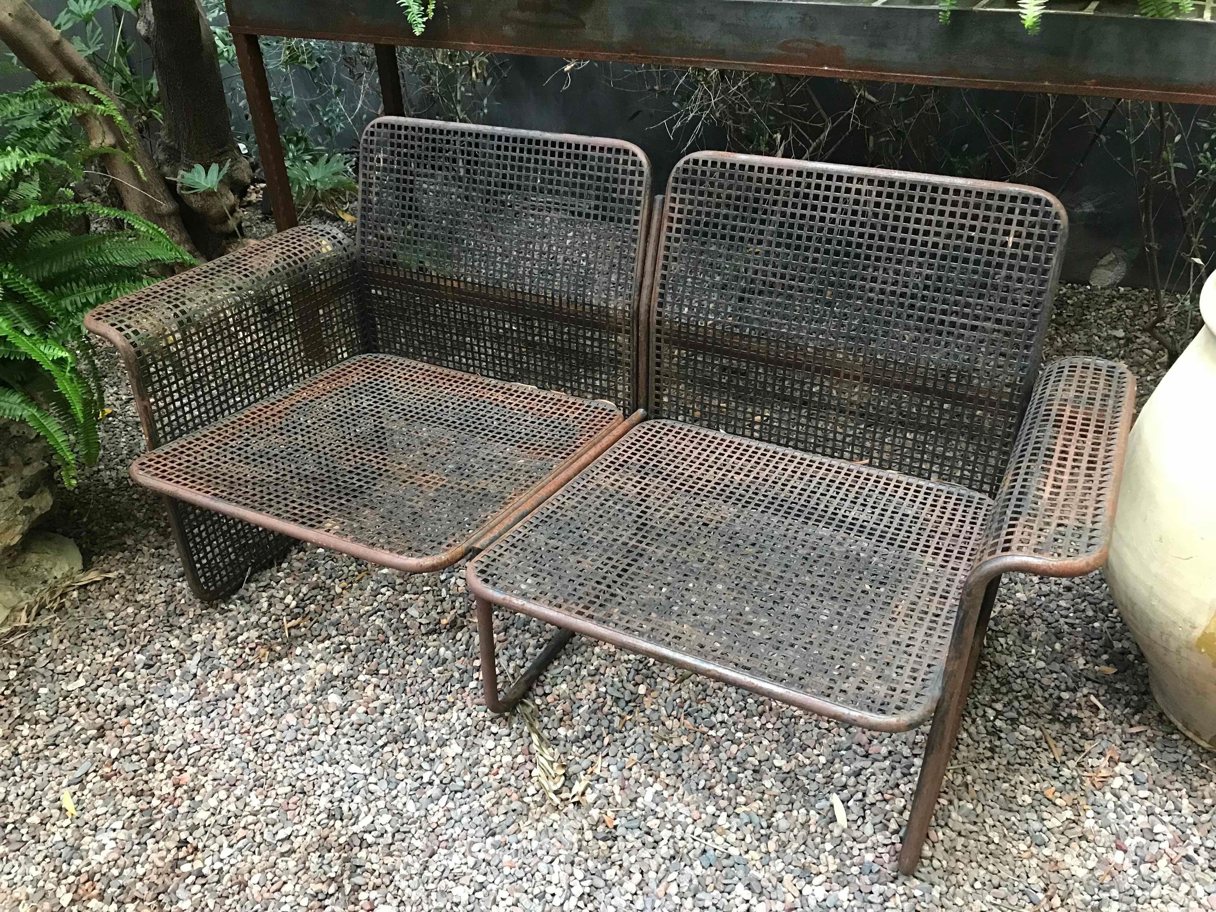 Mid-century modern industrial metal wire two-seat sofa from France. 