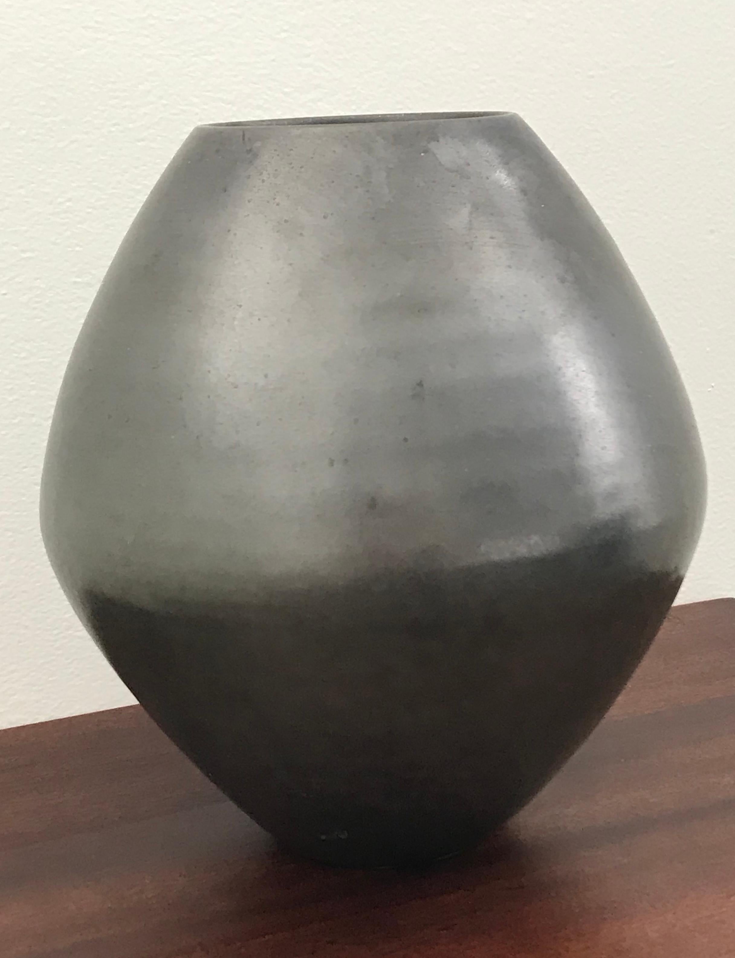 Iridescent glazed ceramic vase in steel gray by Mobach, Netherlands. The Mobach family has been producing kiln fired ceramics for over five generations.