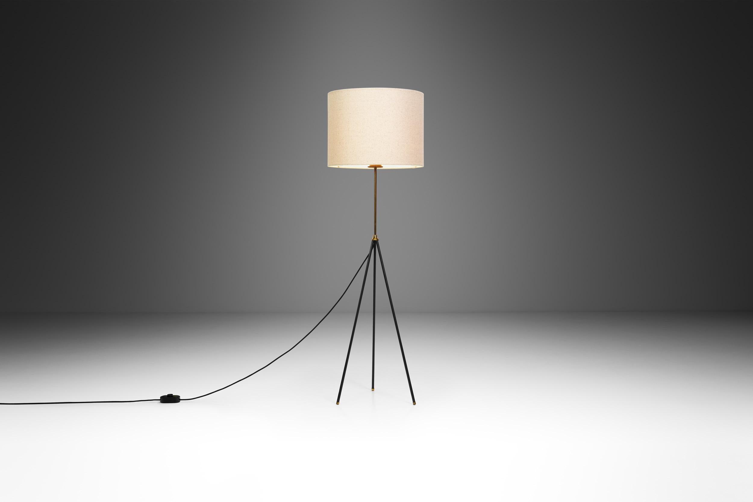 The mid-century era was marked by a departure from ornate, intricate designs and a shift towards simplicity, functionality, and a seamless blend of form and function. Evident with this floor lamp, mid-century lighting fixtures are characterized by
