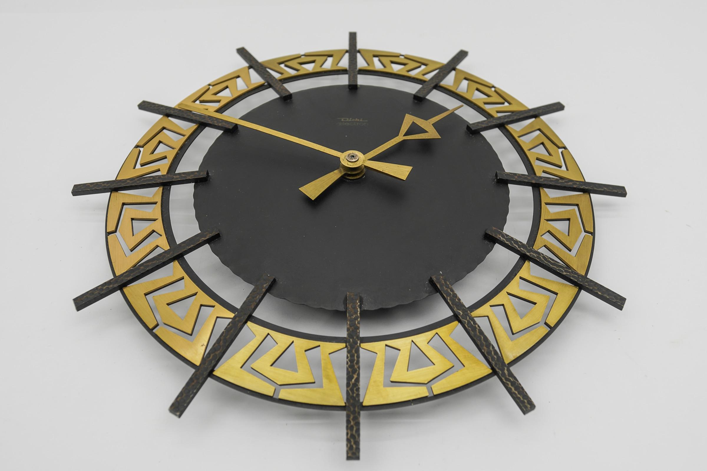 German Mid-Century Modern Iron and brass Wall Clock by Diehl Dilectron, 1960s For Sale