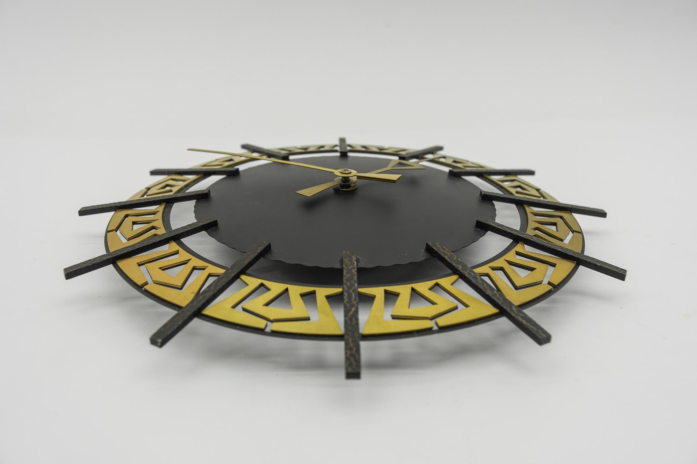 Mid-20th Century Mid-Century Modern Iron and brass Wall Clock by Diehl Dilectron, 1960s For Sale