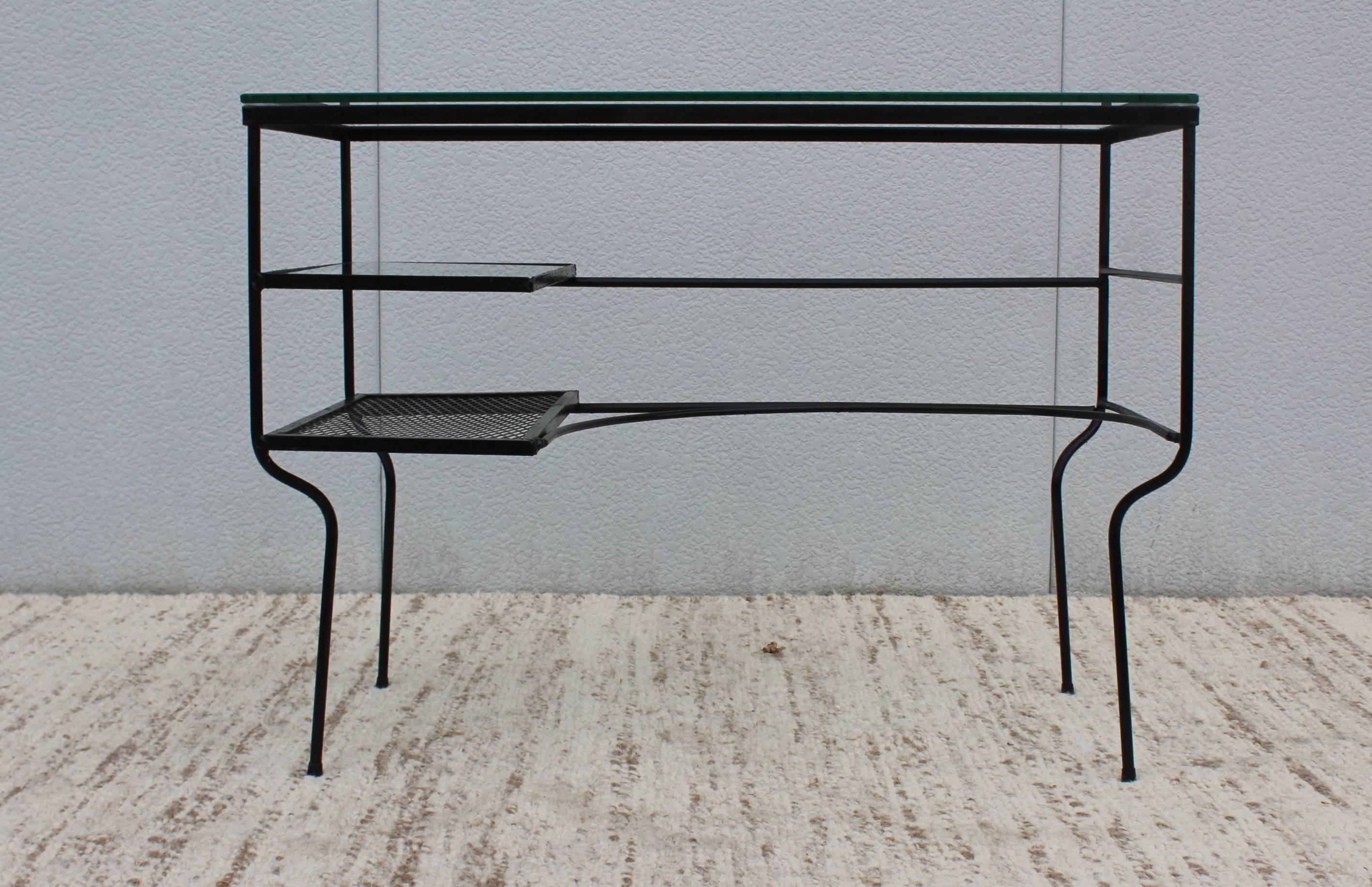 1960s modern iron and glass petite desk in the style of Maurizio Tempestini.