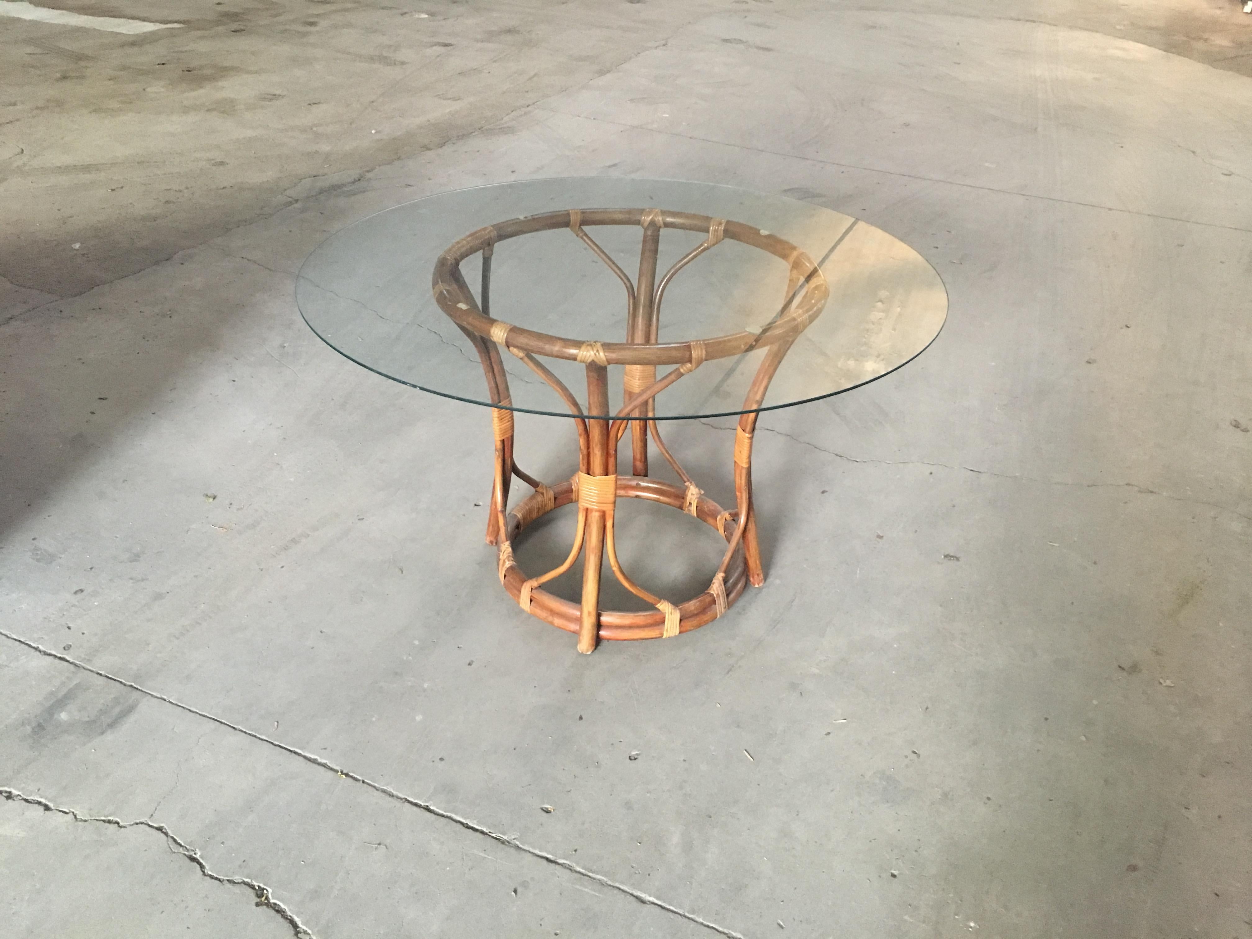 Mid-Century Modern Italian bamboo and cane round table with glass top, 1970s.