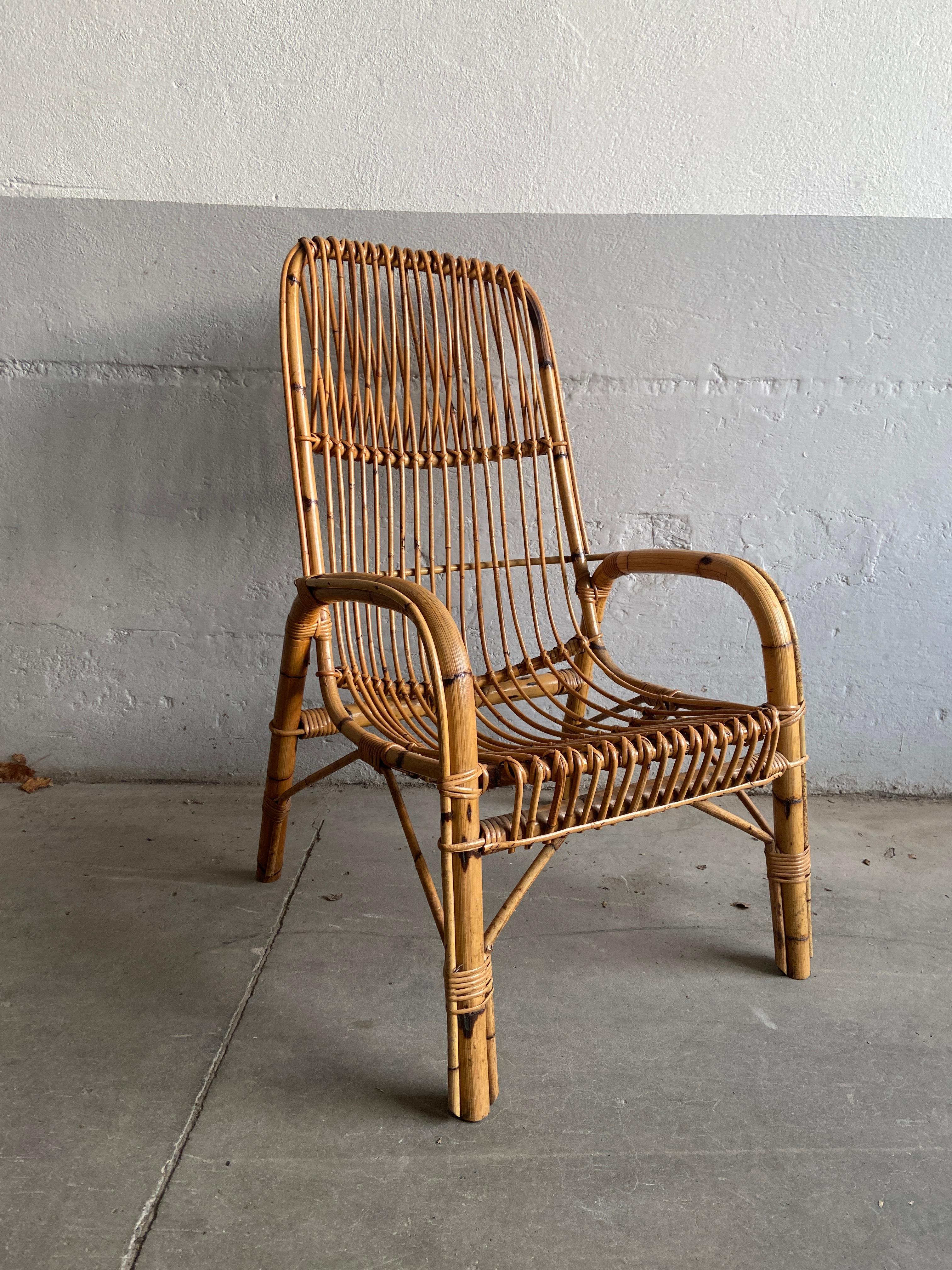 Mid-Century Modern Italian bamboo and rattan armchair in the style of Franco Albini. 1970s.