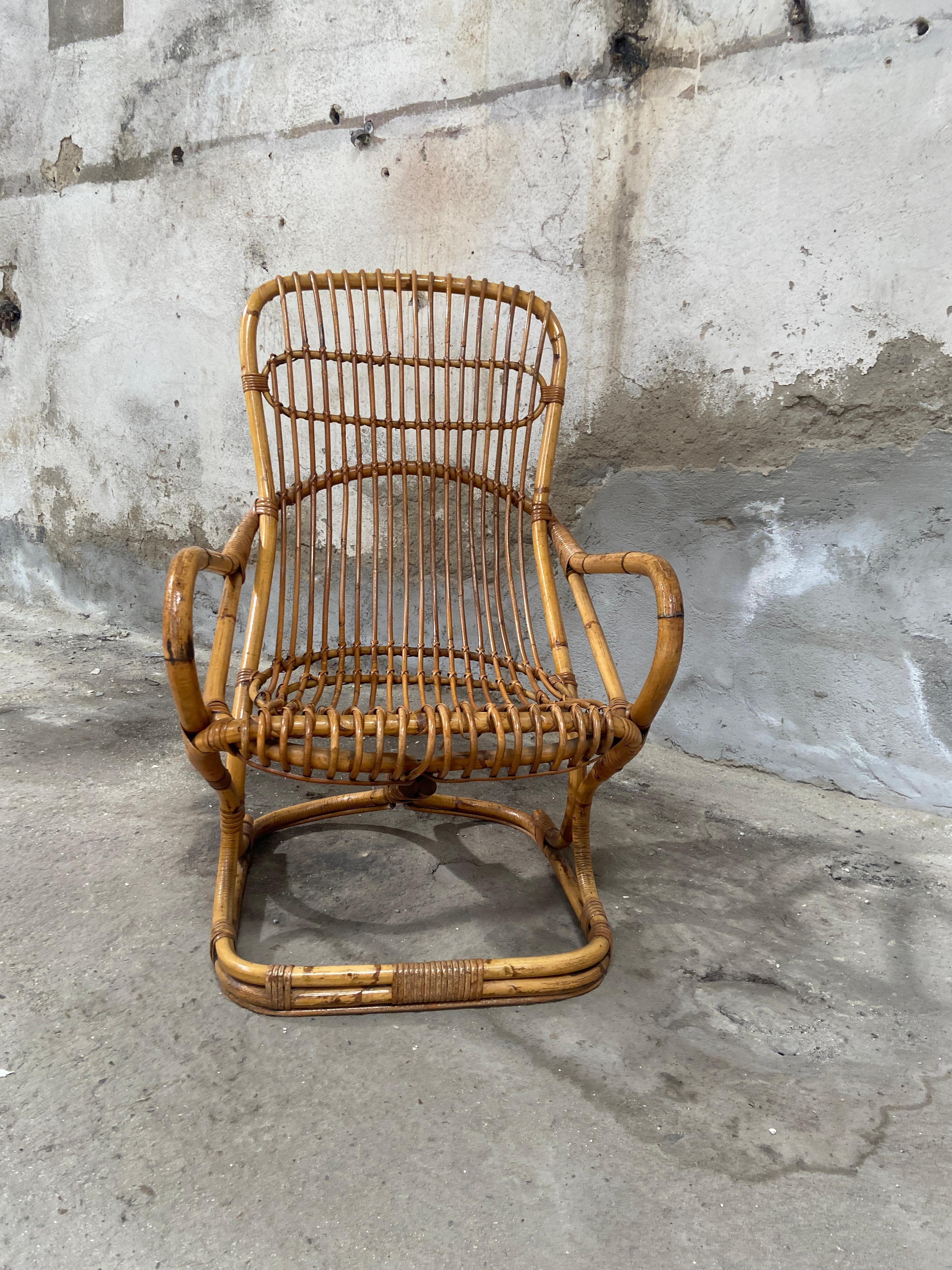 Mid-20th Century Mid-Century Modern Italian Rattan Armchair by Tito Agnoli for Bonacina. 1960s For Sale