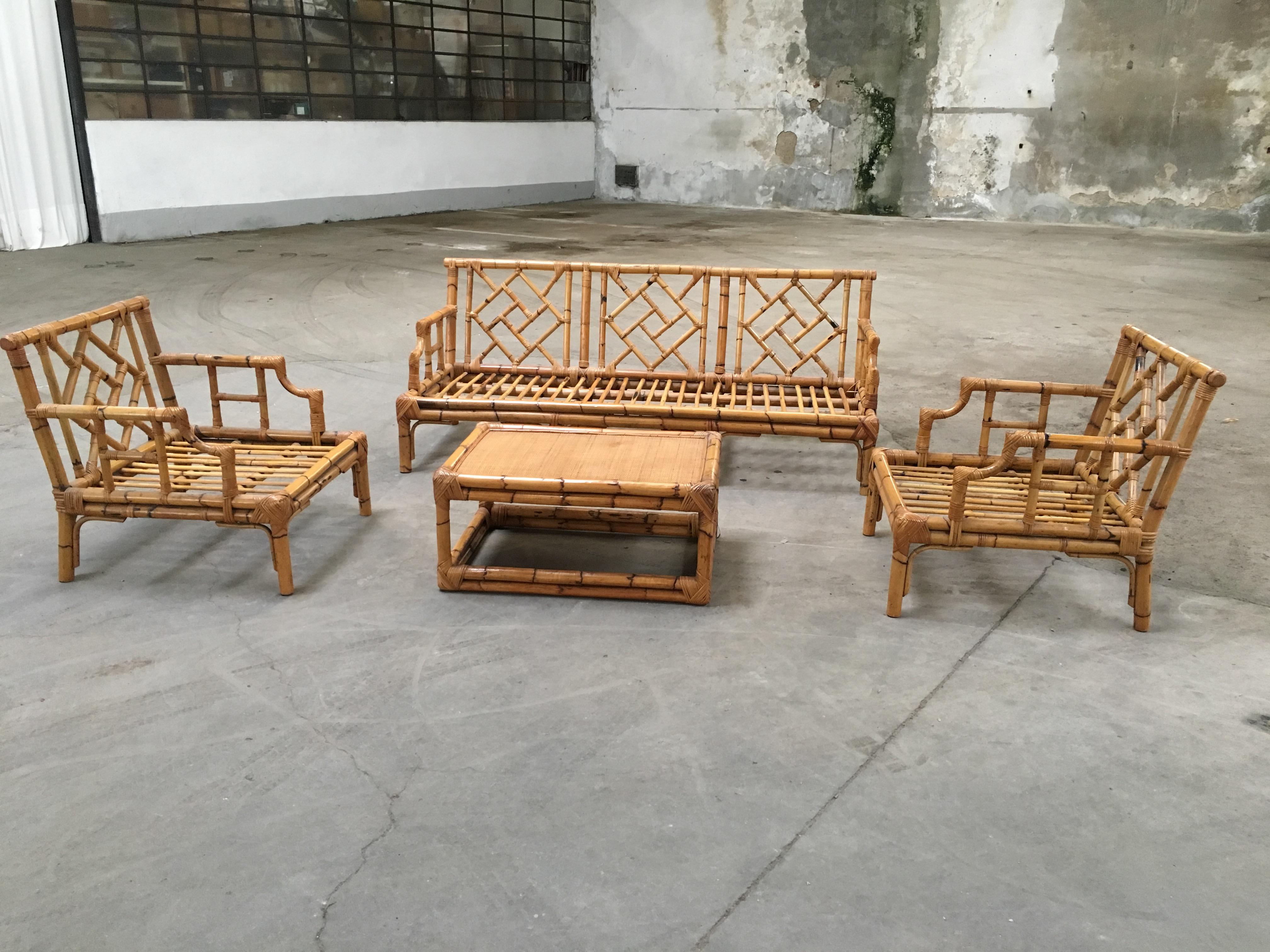 Mid-Century Modern Italian bamboo living room set by Vivai del Sud.
The set consist on 1 sofa, 2 armchairs and 1 coffee table
Measurements: 
Sofa width cm. 195, depth cm. 76, height cm. 77 (Seat height cm. 32) 
Armchairs width cm. 75, depth cm.