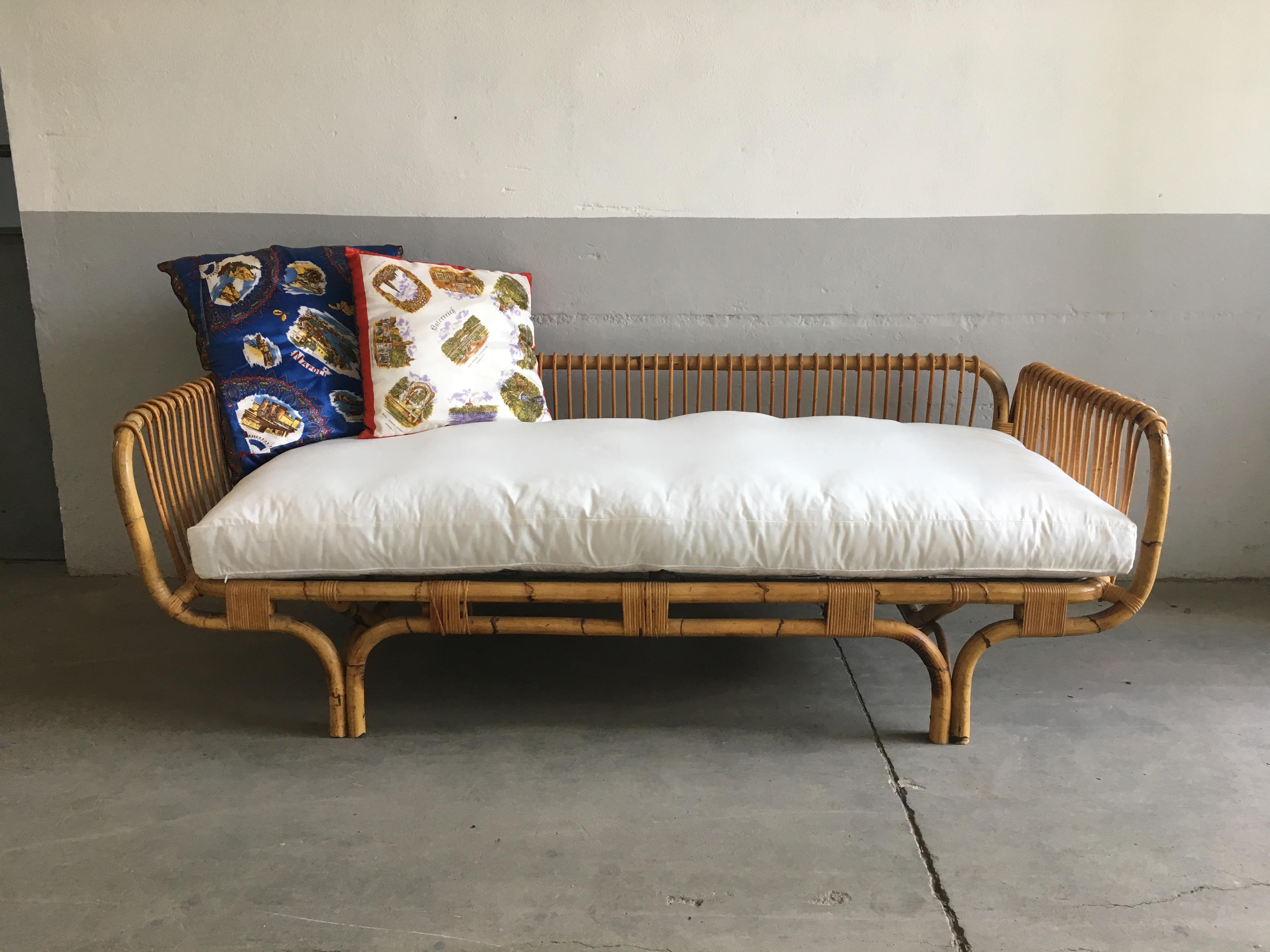Mid-Century Modern Italian bamboo sofa or daybed. 1970s
This sofa bed needs a mattress of cm. 190 x 80 (Standard Italian single bed)
The sofa comes only with its bed net. Cushion is not included in the price of this item. Quotation on request.
 
