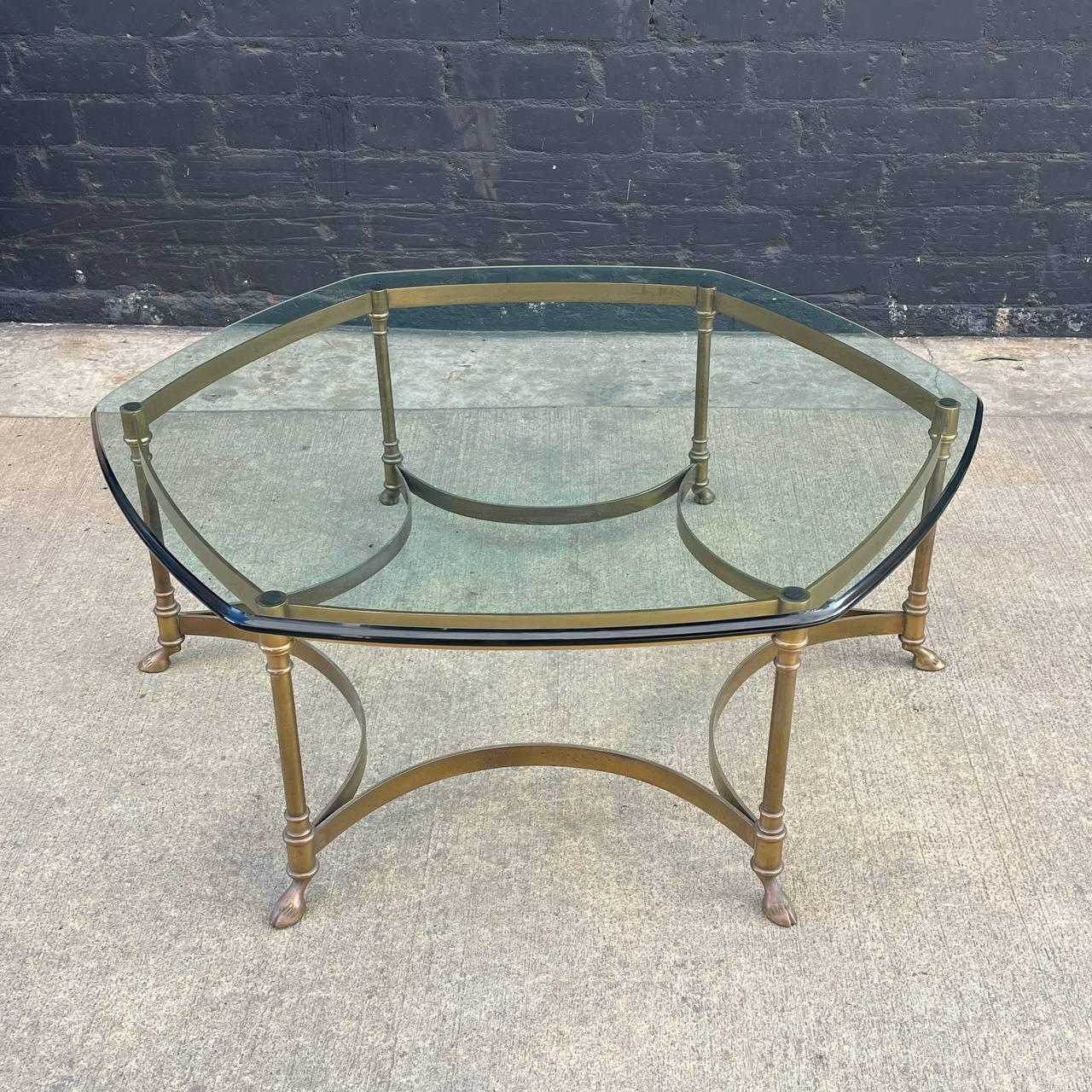 Mid-Century Modern Italian Brass & Glass Coffee Table with Hoof Feet

Original Vintage Condition

Dimensions: 15”H x 39”W x 39”D