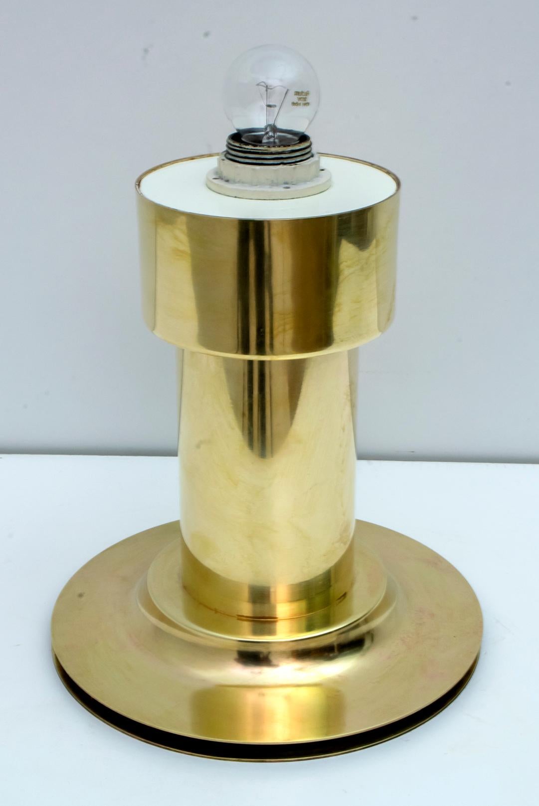 Cylindrical table lamps made of solid brass of excellent workmanship.