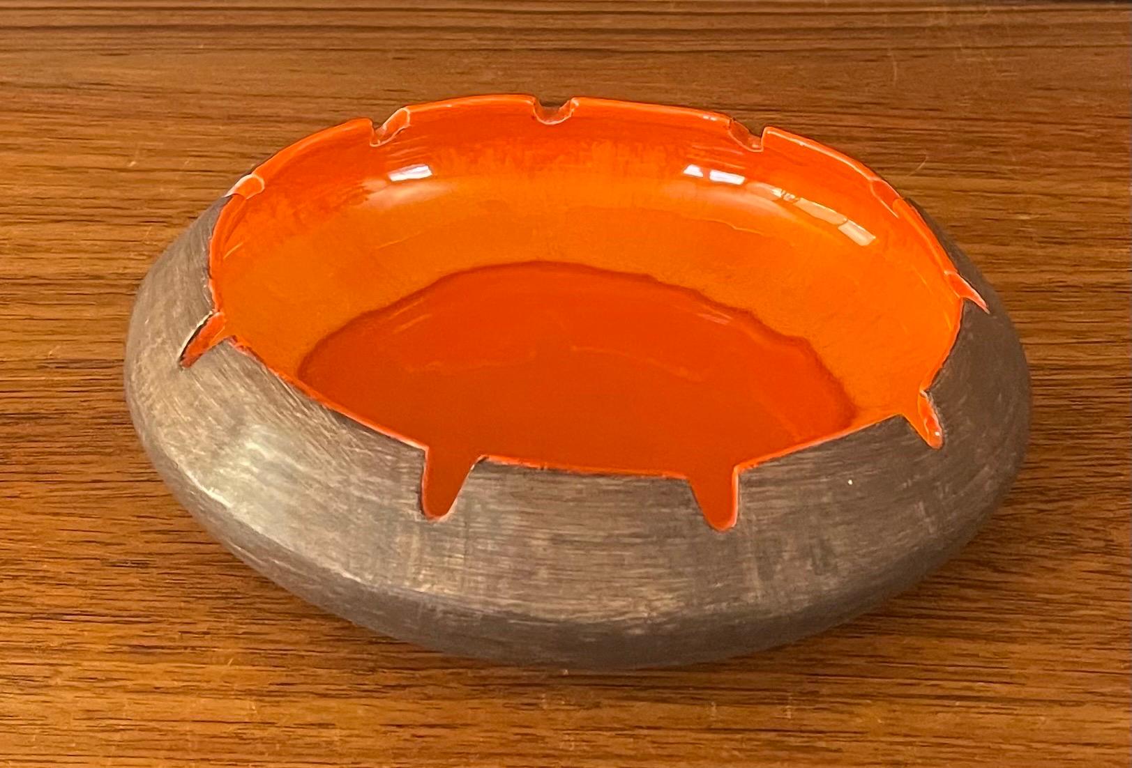 vintage orange ashtray