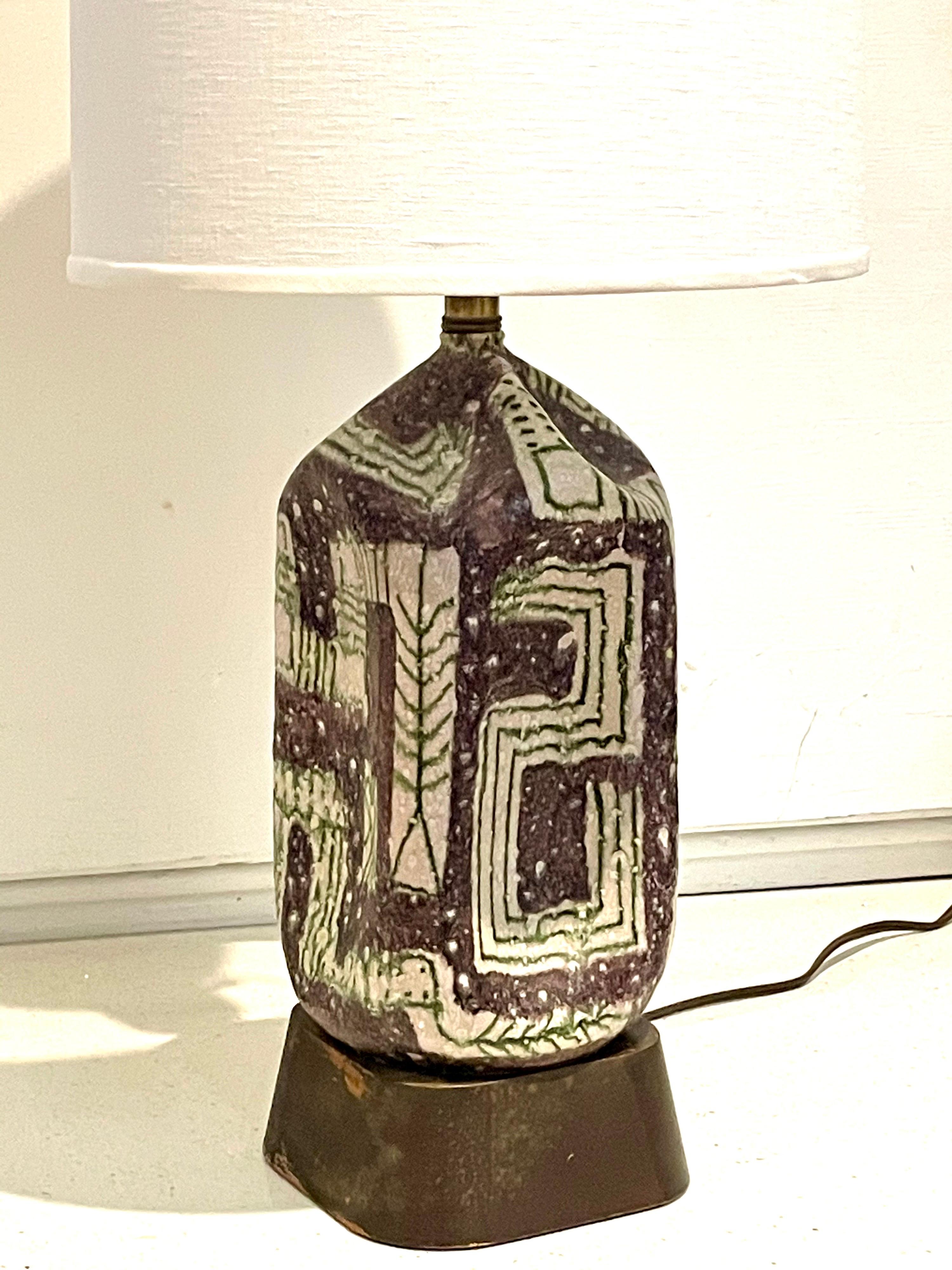 Beautiful and rare early ceramic table lamp in original condition, signed with donkey mark lamp by Gambone, Italy for Marbro Lighting company, circa 1950's nice glaze and design original base in a worn wood finish with glass shade, we have put a new