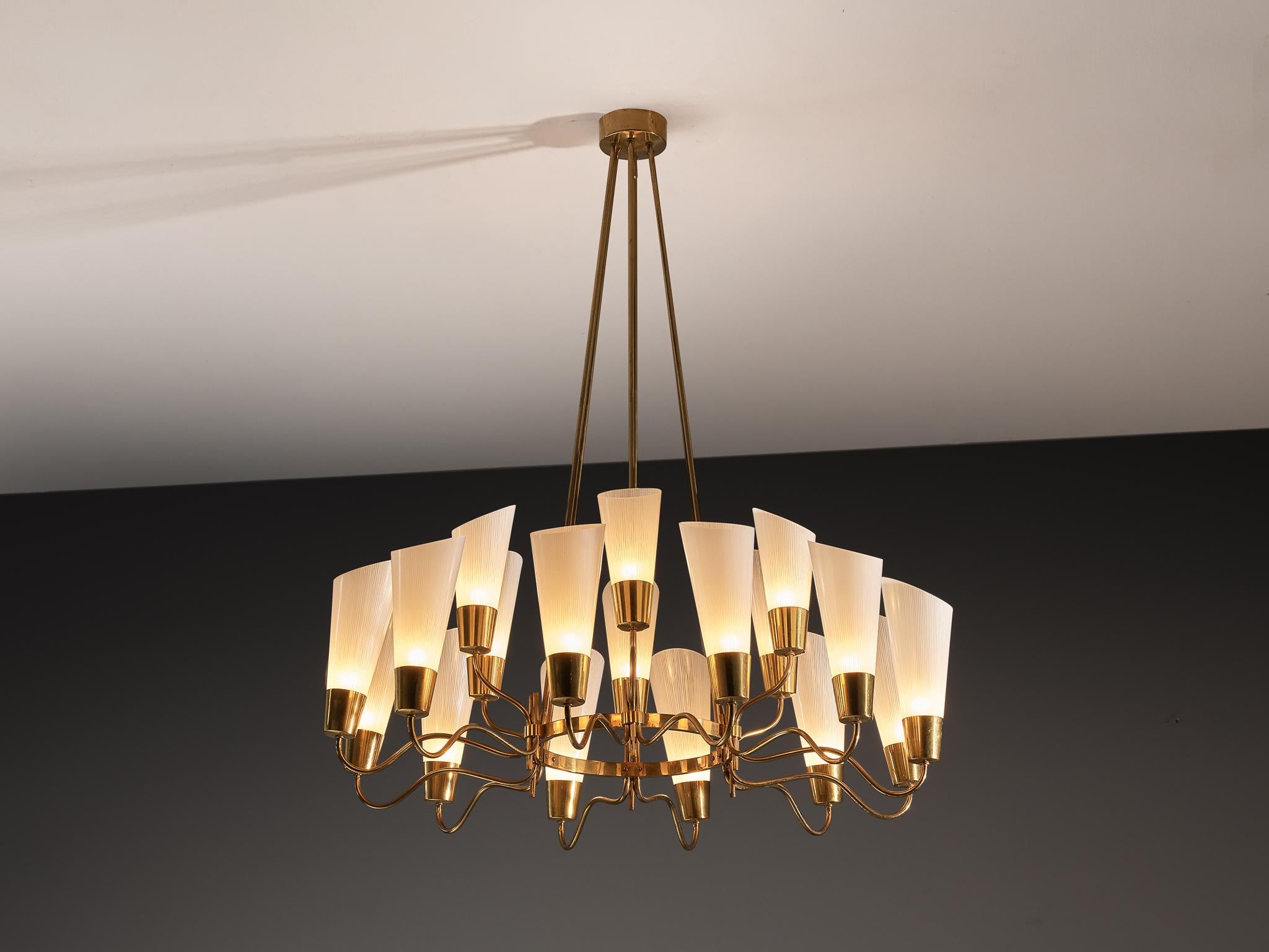 Chandelier, brass, frosted glass, Italy, 1950s/60s

An Italian Mid-Century Modern chandelier that exhibits a radial, multi-tiered composition with an elegant symmetrical arrangement of light fixtures extending outward from a central brass structure.