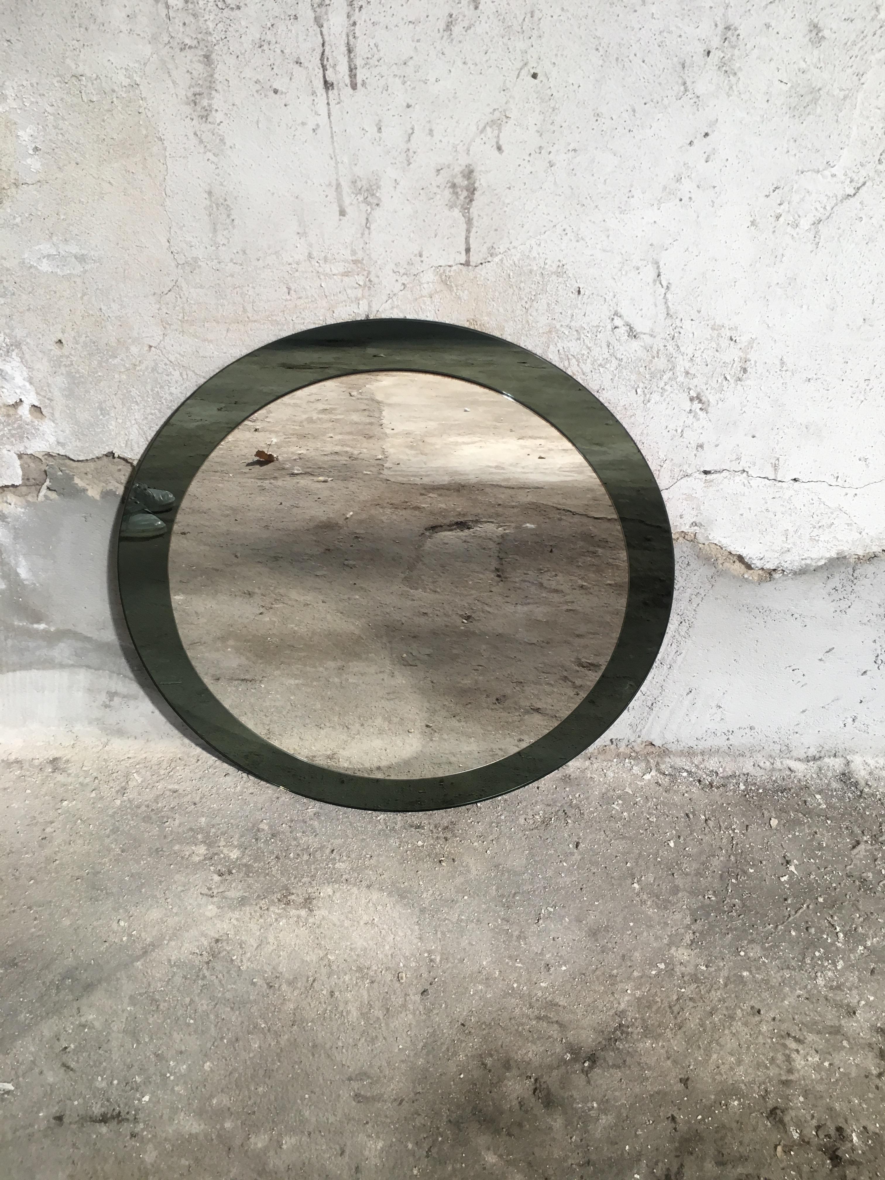 Mid-Century Modern Italian circle dark green glass framed mirror in the style of Max Ingrand, 1970s.
