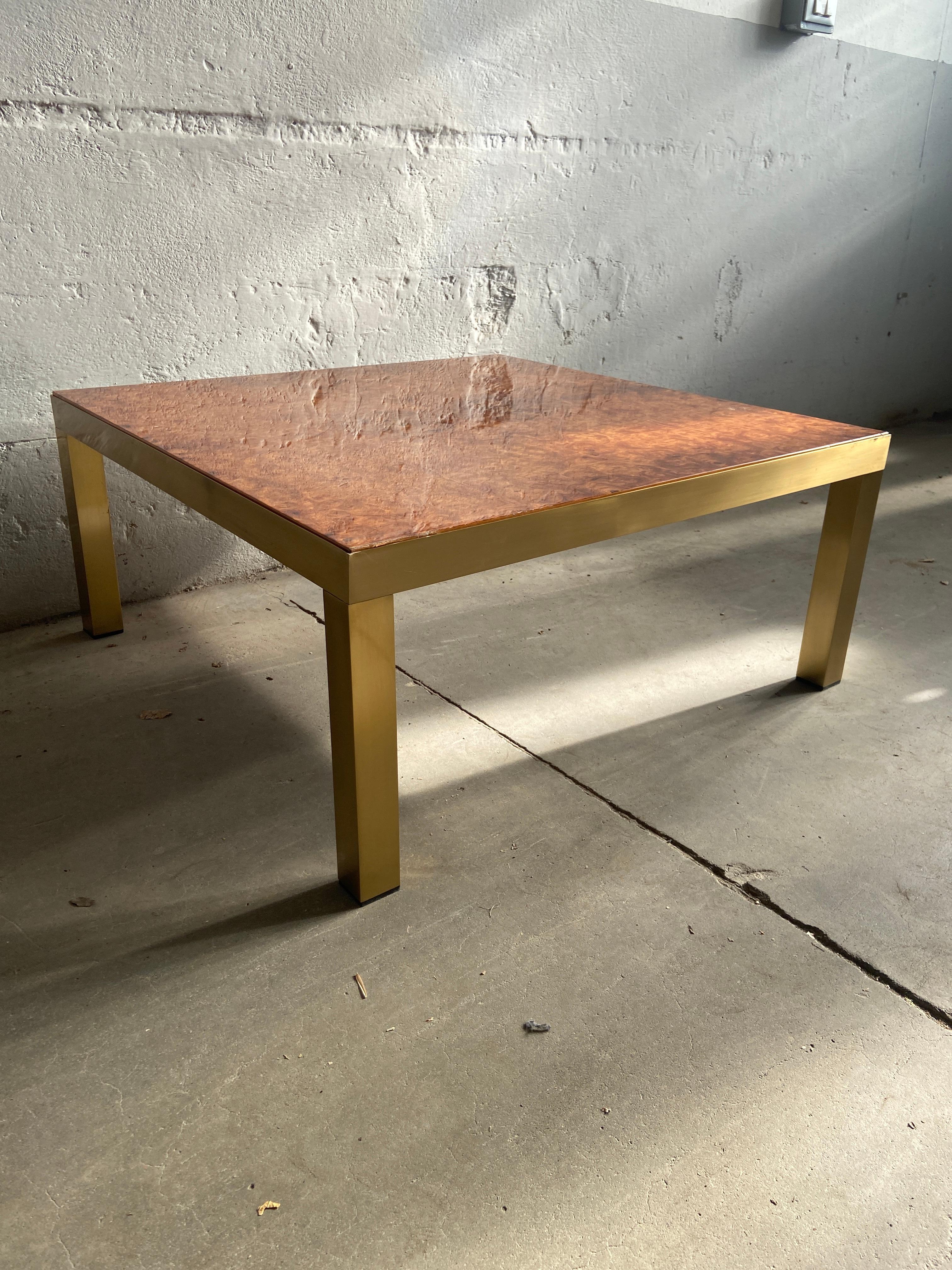 Mid-Century Modern Italian coffee or sofa table with brass finish lacquered metal base and shiny briar-root top
The measures of the table are cm.90x90xh40; this table can become a set together with another bigger but identical coffee table