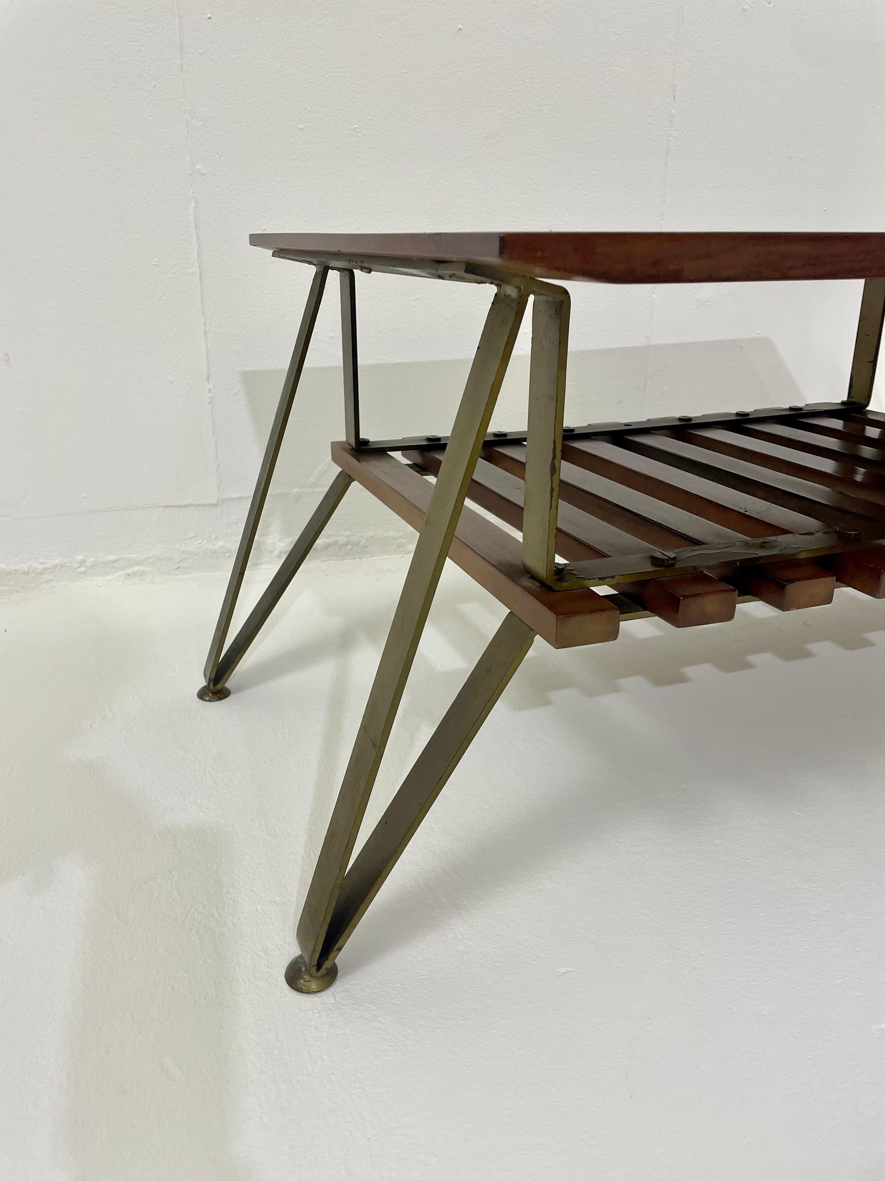 Mid-Century Modern Italian coffee table with magazine rack, wood and metal, 1960s.
