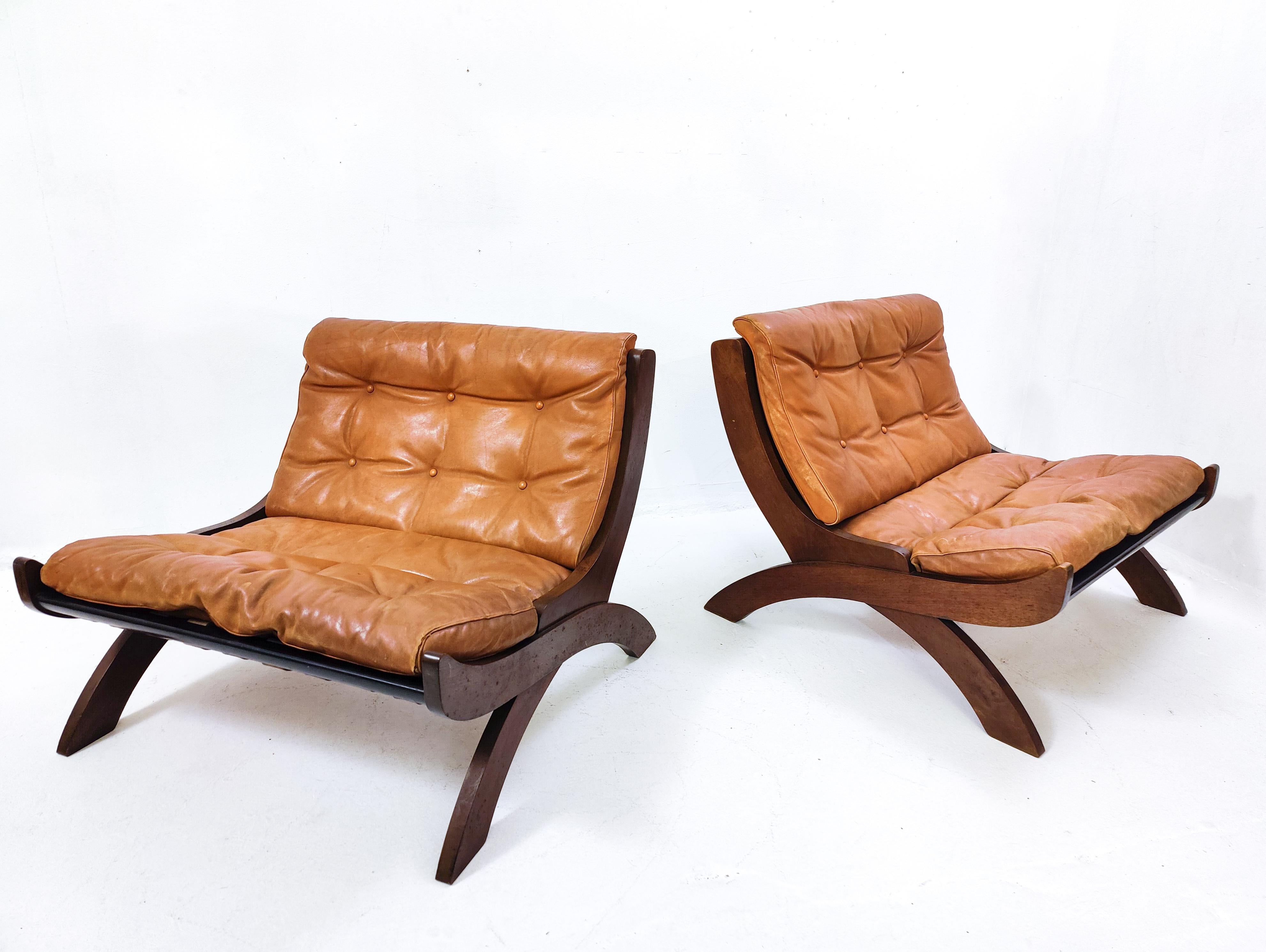 Mid-Century Modern Italian Cognac leather armchairs, 1960s.

